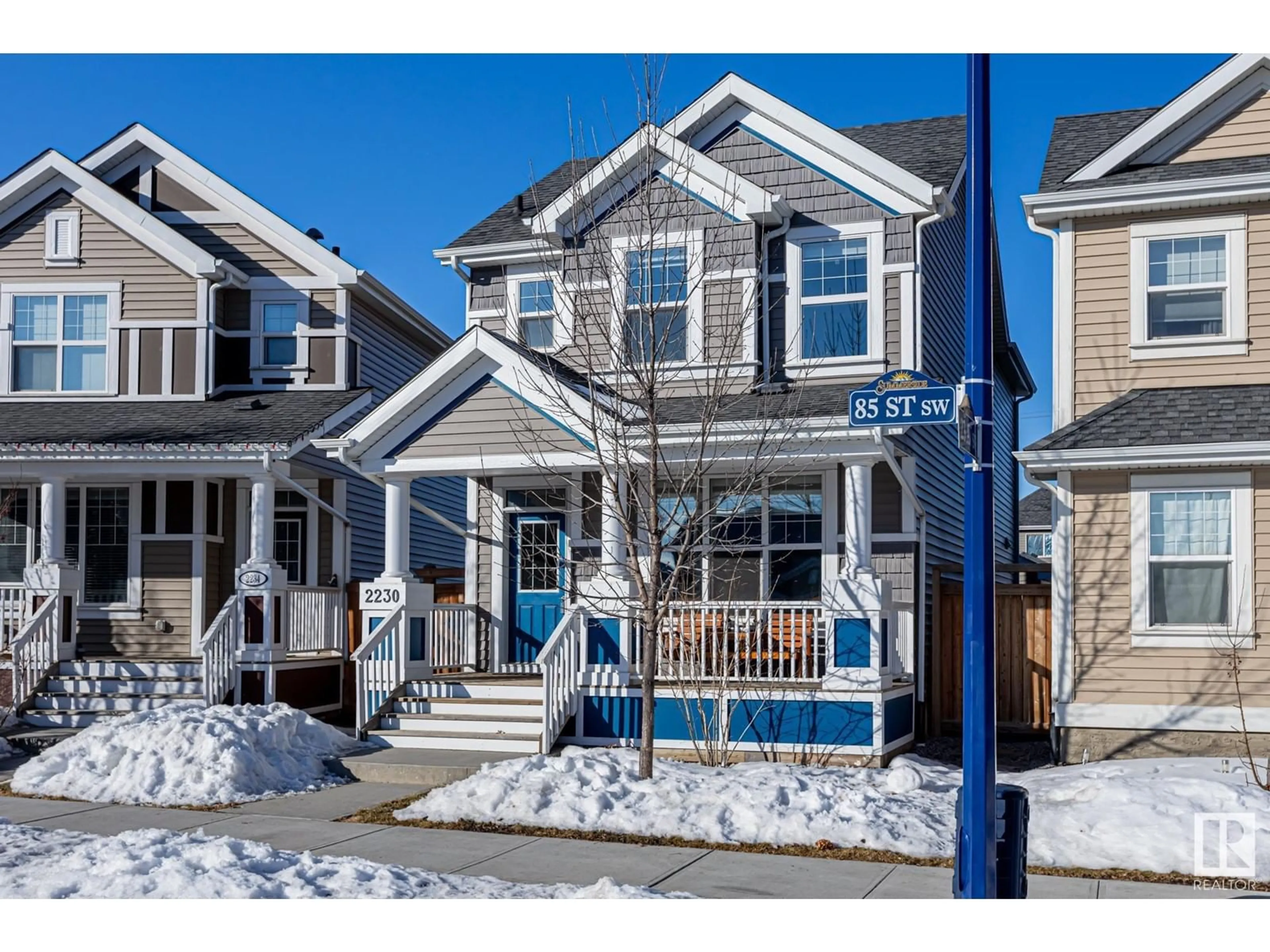 Home with vinyl exterior material, street for 2230 85 Street SW, Edmonton Alberta T6X2G1