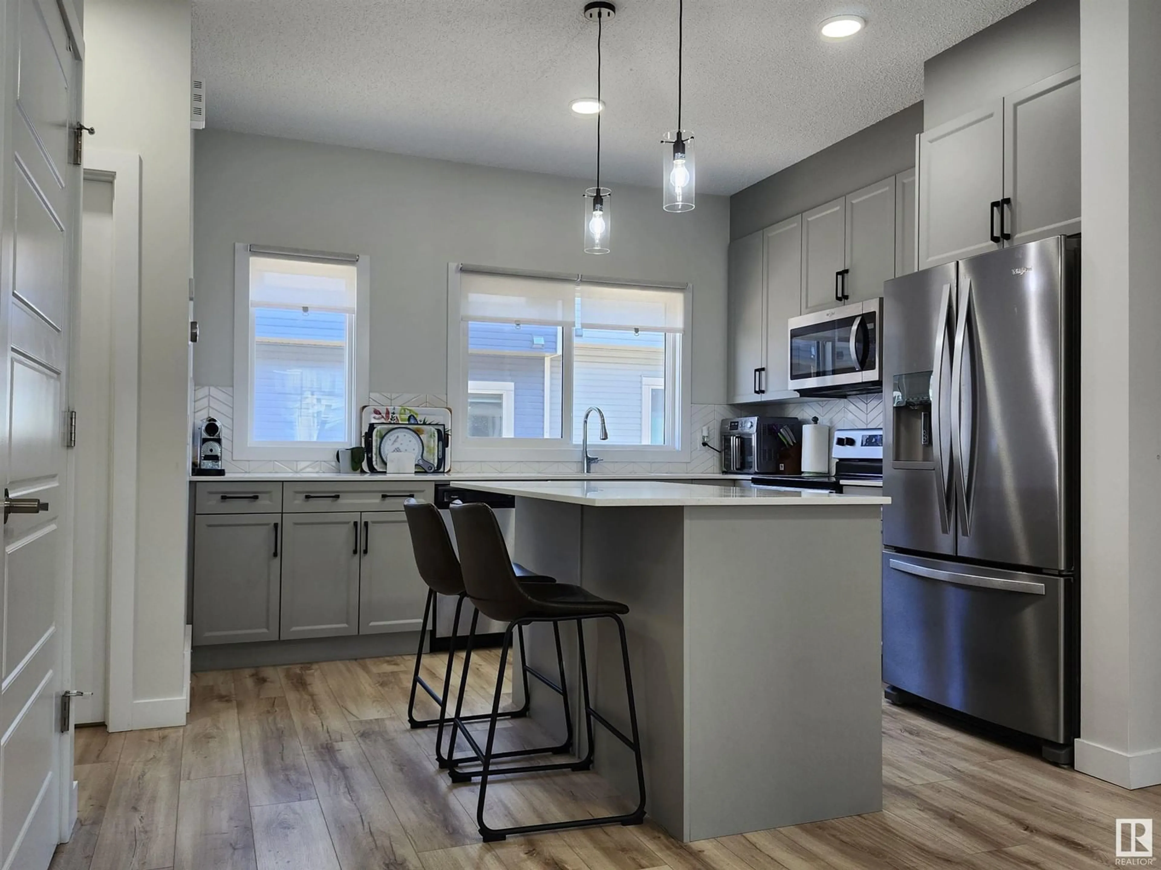 Open concept kitchen, unknown for #8 6214 CARTMELL CO SW, Edmonton Alberta T6W5A7