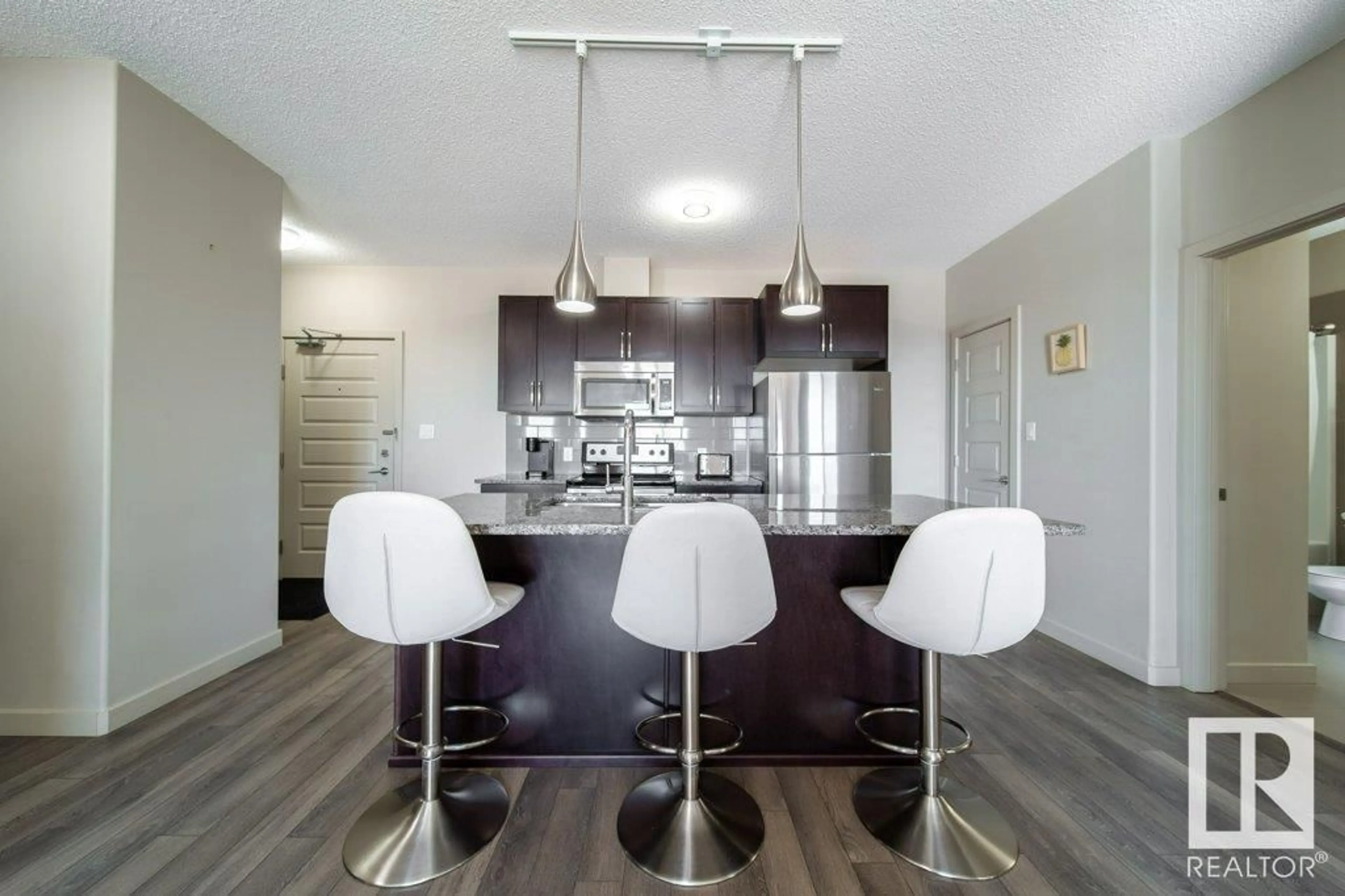 Open concept kitchen, unknown for #319 503 ALBANY WY NW, Edmonton Alberta T6V0M5