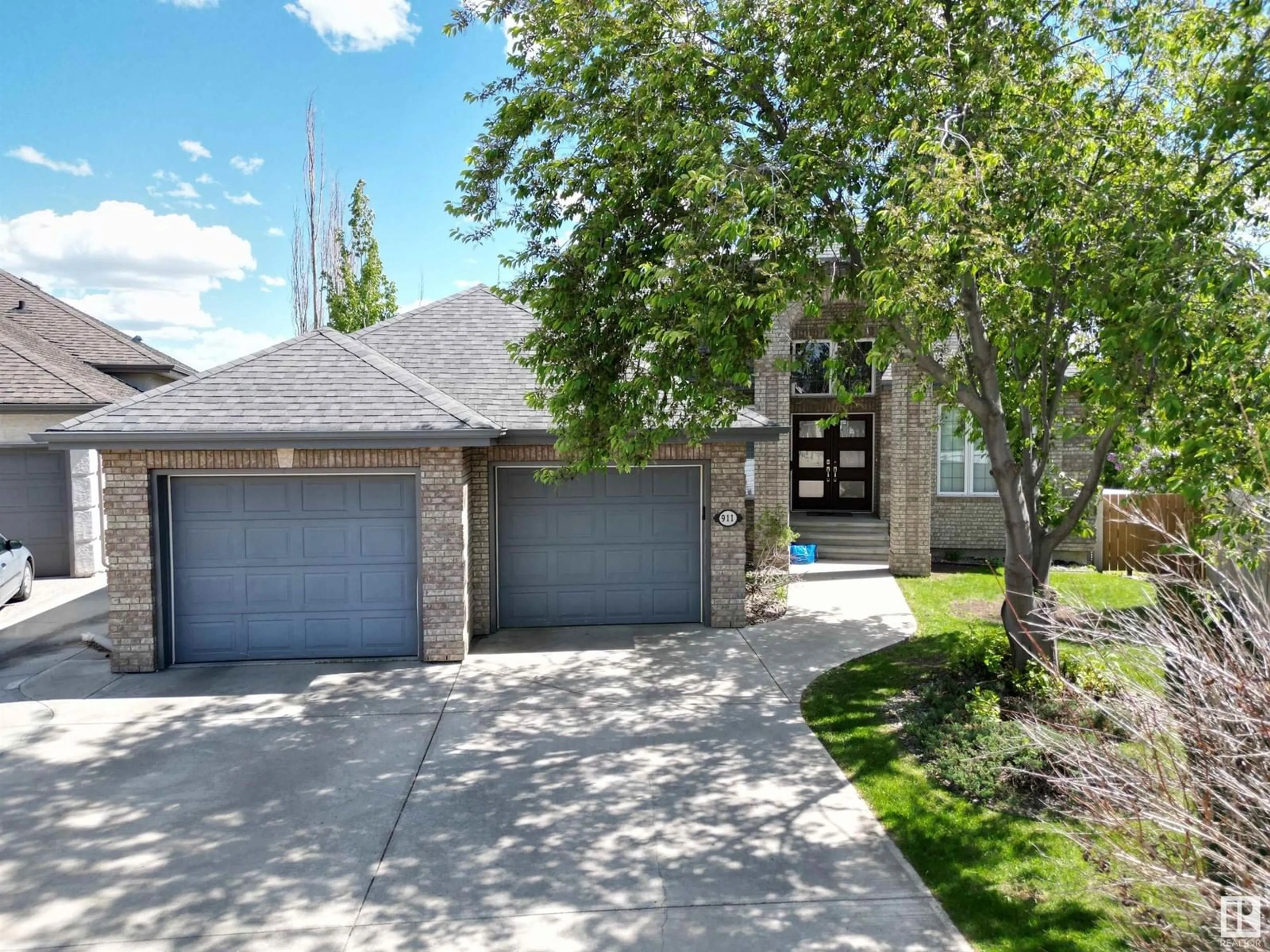 Home with brick exterior material, street for 911 LAMB CR NW, Edmonton Alberta T6R2X8