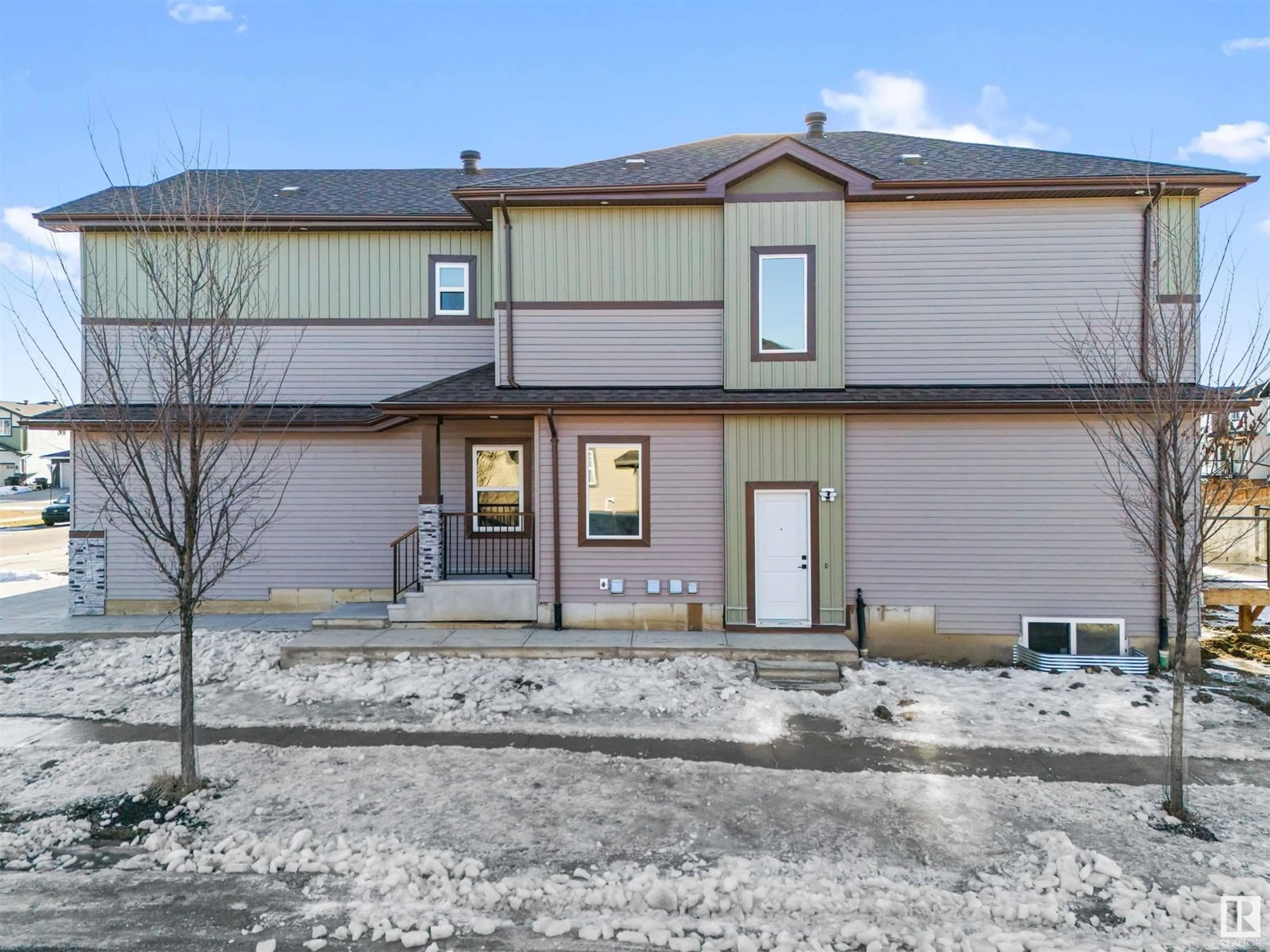 A pic from outside/outdoor area/front of a property/back of a property/a pic from drone, street for SW - 204 CAVANAGH COMMON, Edmonton Alberta T6W4H4