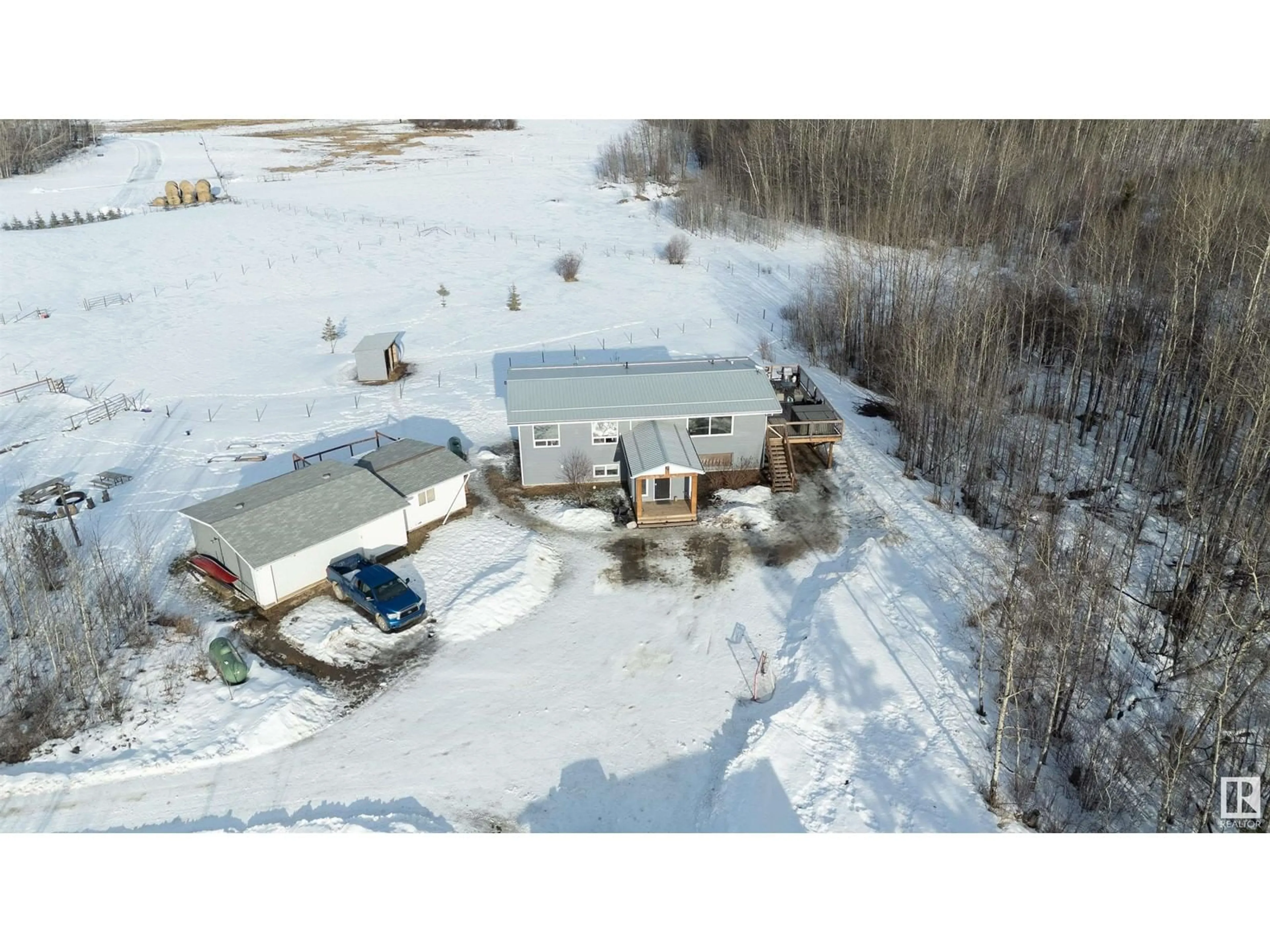 A pic from outside/outdoor area/front of a property/back of a property/a pic from drone, building for 56319 RGE RD 13, Rural Barrhead County Alberta T0E1V0