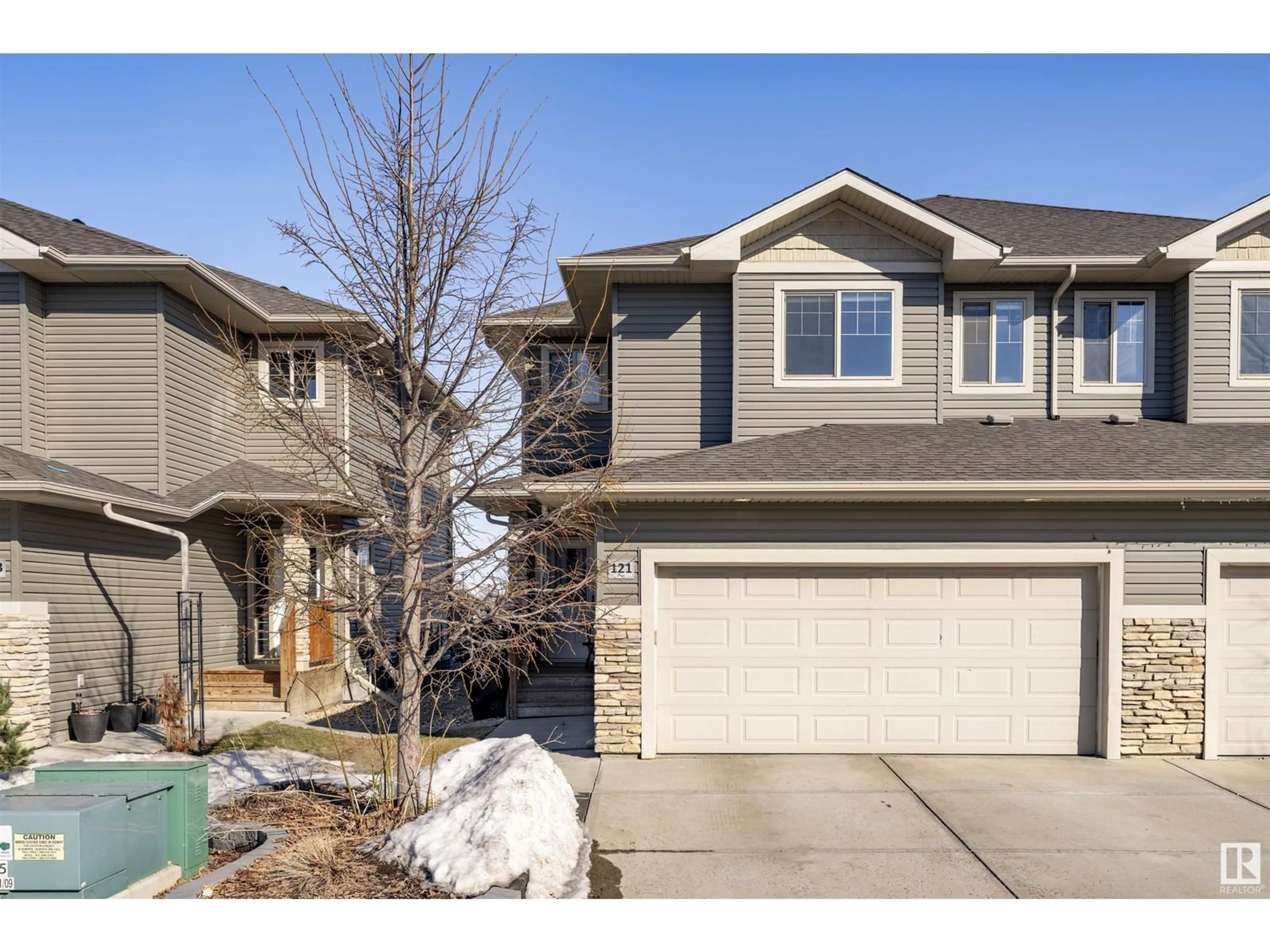 Home with vinyl exterior material, street for #121 8602 SOUTHFORT BV, Fort Saskatchewan Alberta T8L0J8