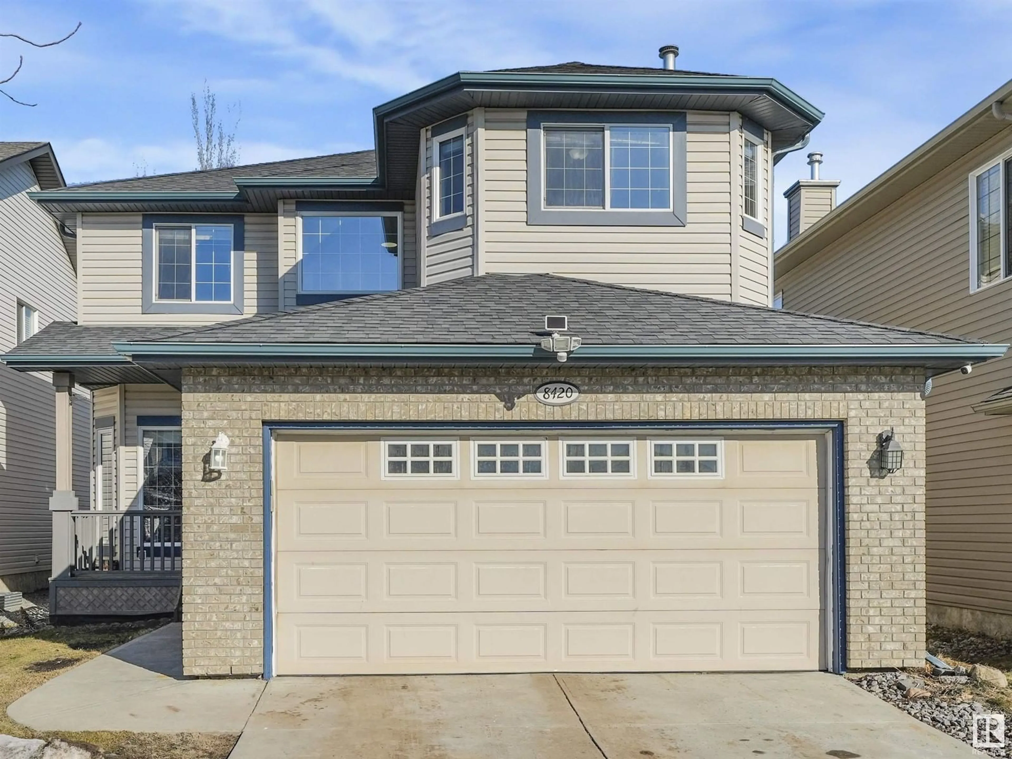 Home with vinyl exterior material, street for 8420 SLOANE CR NW, Edmonton Alberta T6R0L2