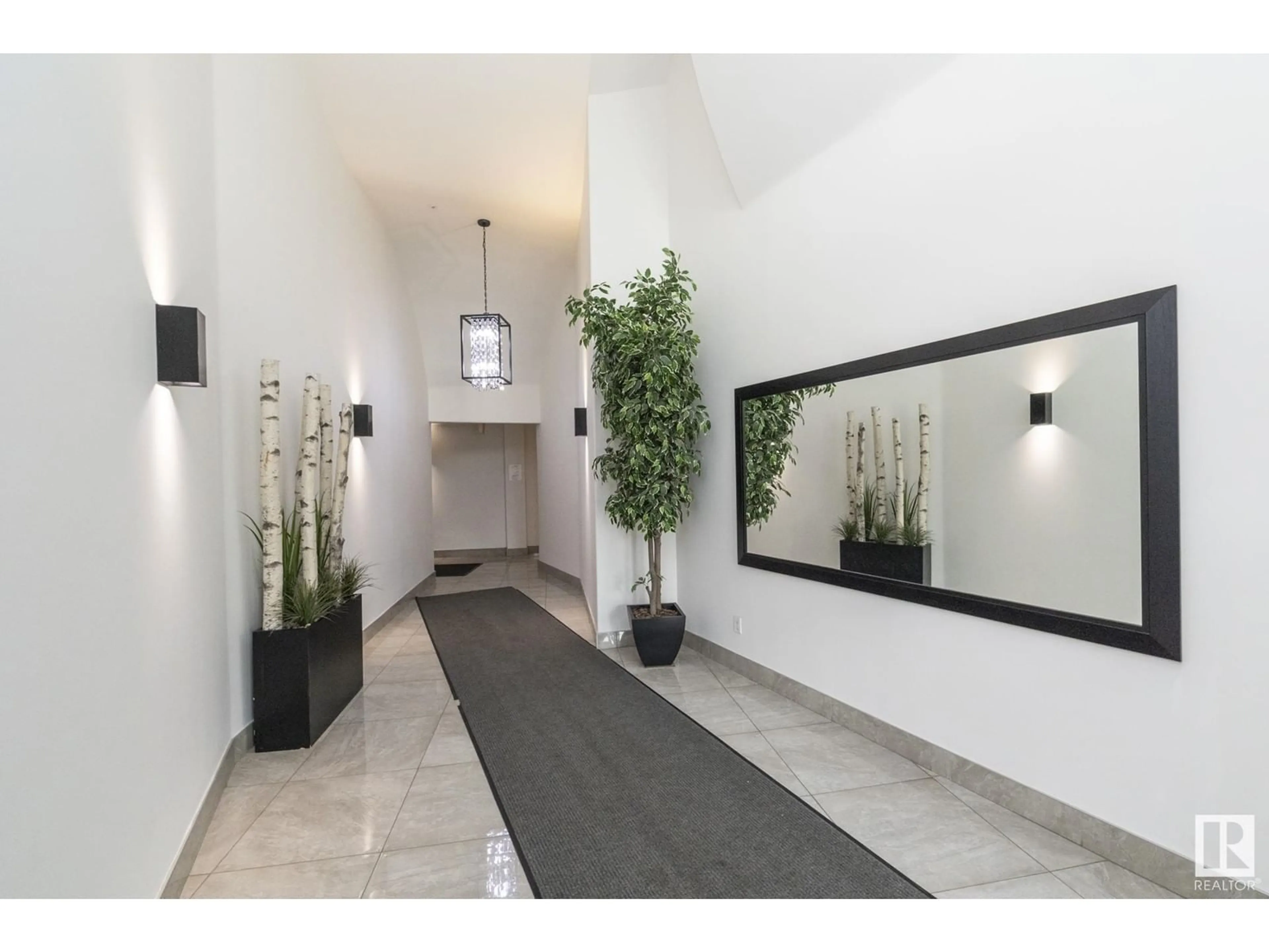 Indoor foyer for #102 - 10855 SASKATCHEWAN DR, Edmonton Alberta T6E6T6