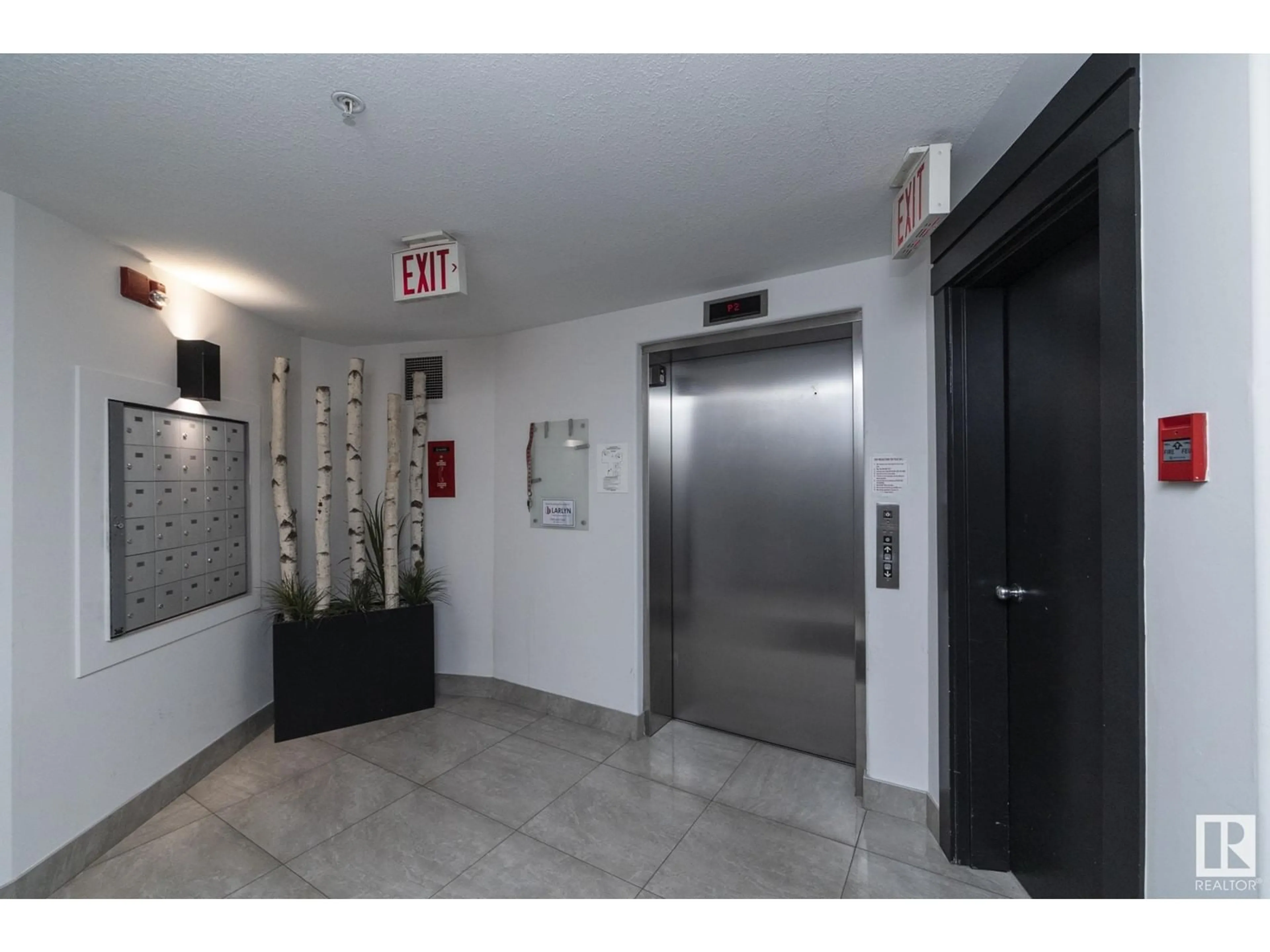 Indoor foyer for #102 - 10855 SASKATCHEWAN DR, Edmonton Alberta T6E6T6