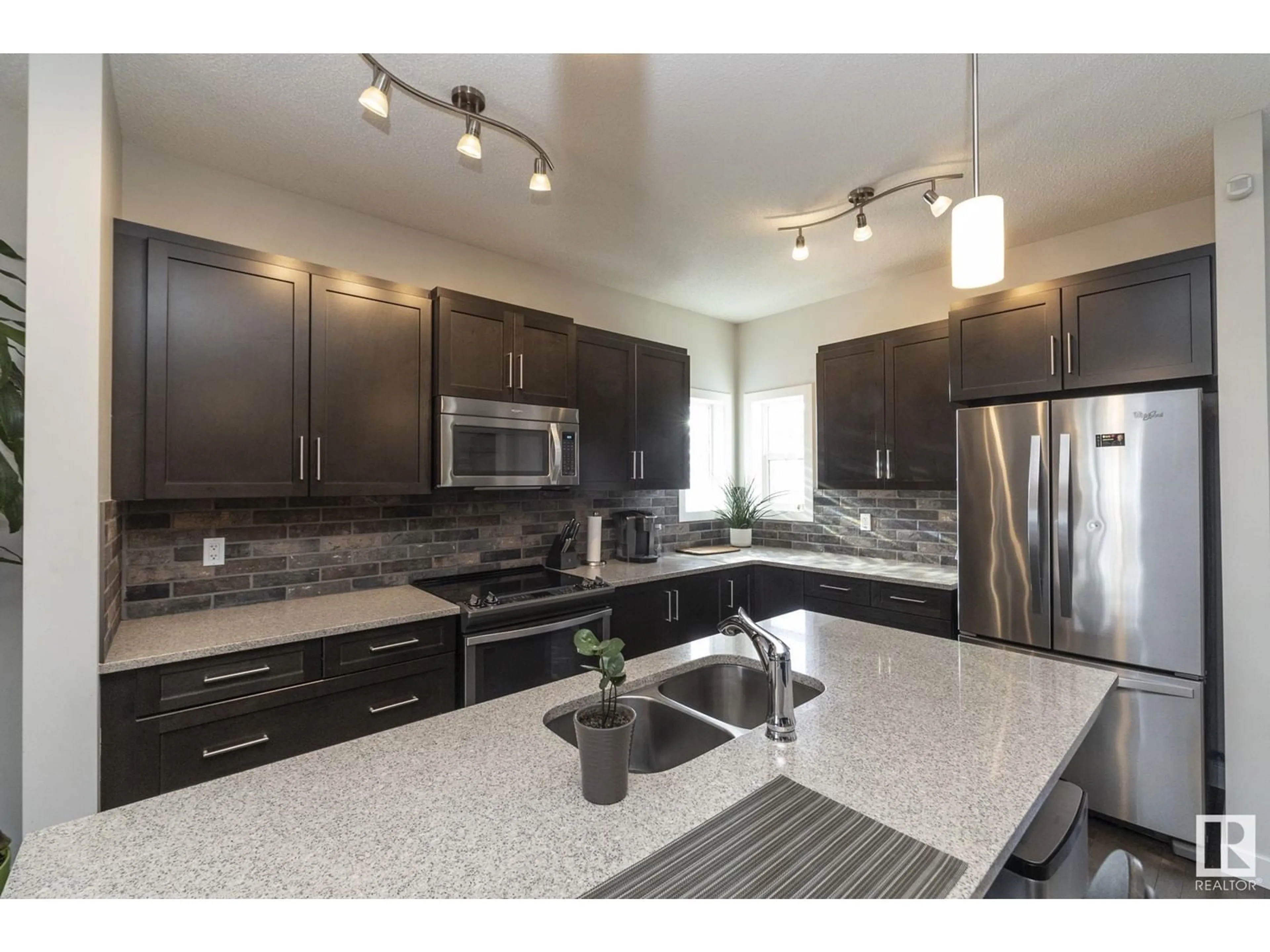 Open concept kitchen, unknown for 17616 58 ST NW, Edmonton Alberta T5Y0V2