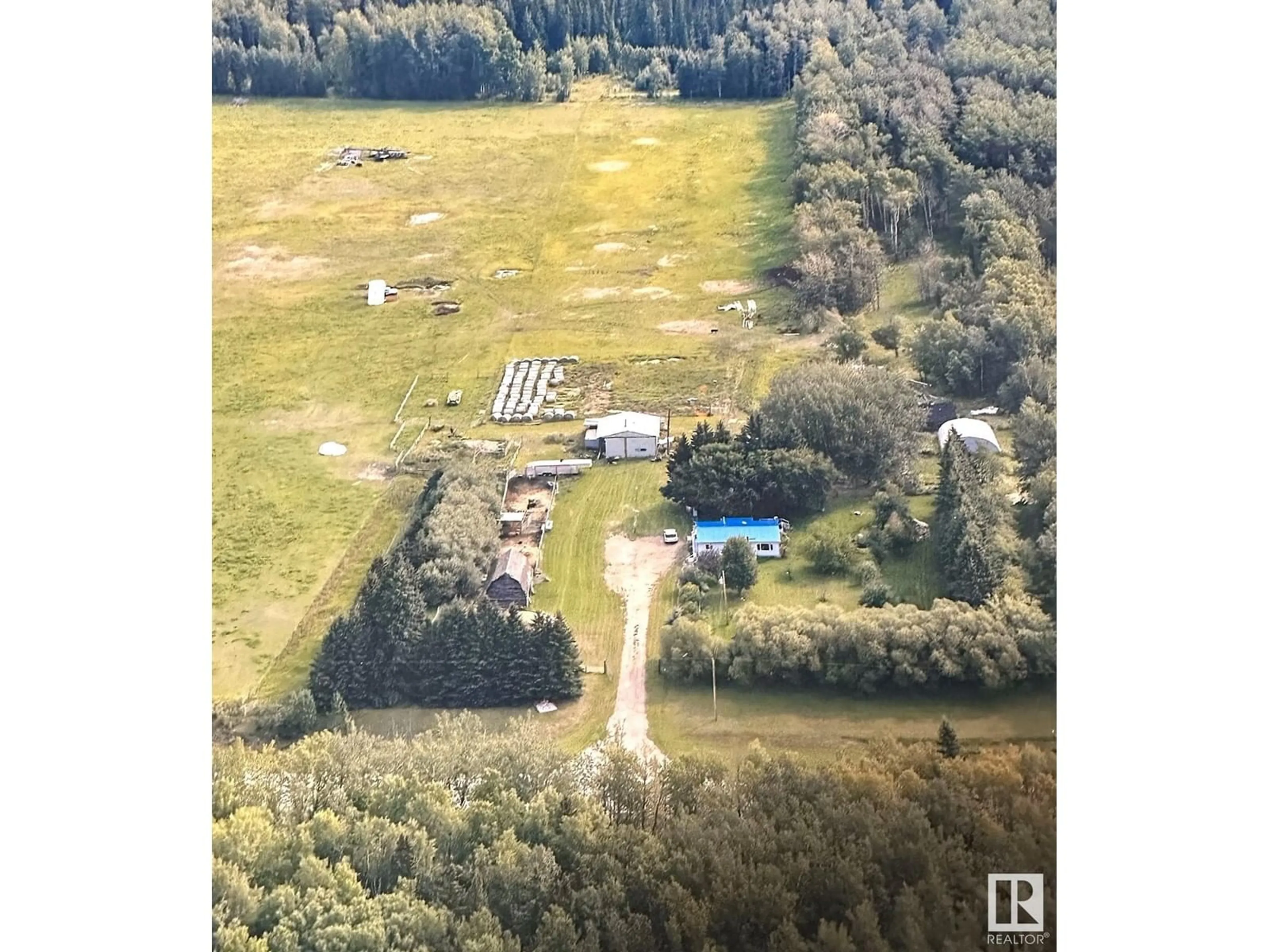 A pic from outside/outdoor area/front of a property/back of a property/a pic from drone, forest/trees view for 55017 Highway 751, Rural Yellowhead Alberta T0E1S0