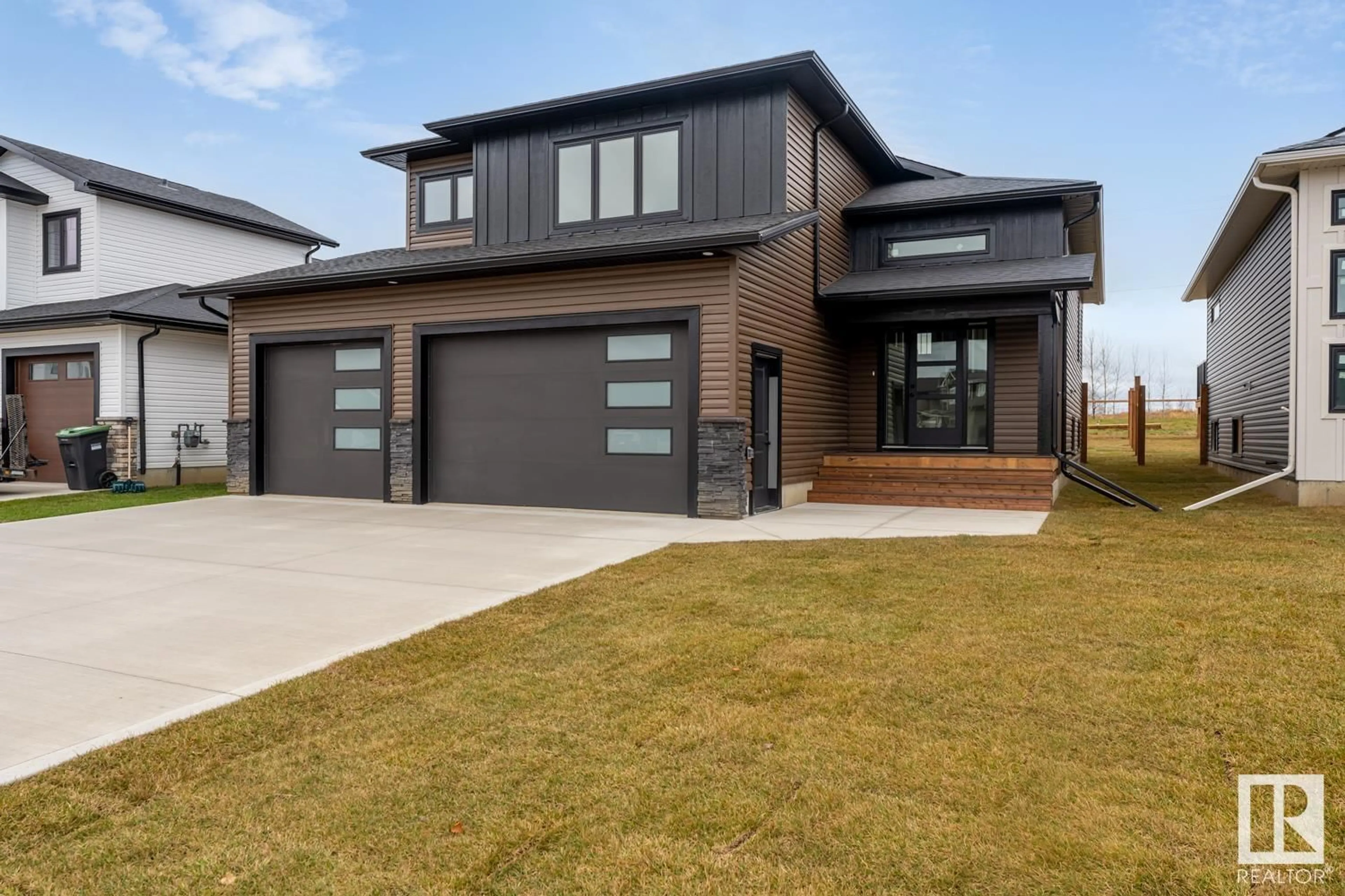 Home with vinyl exterior material, street for 809 SCHOONER DR, Cold Lake Alberta T9M0L7