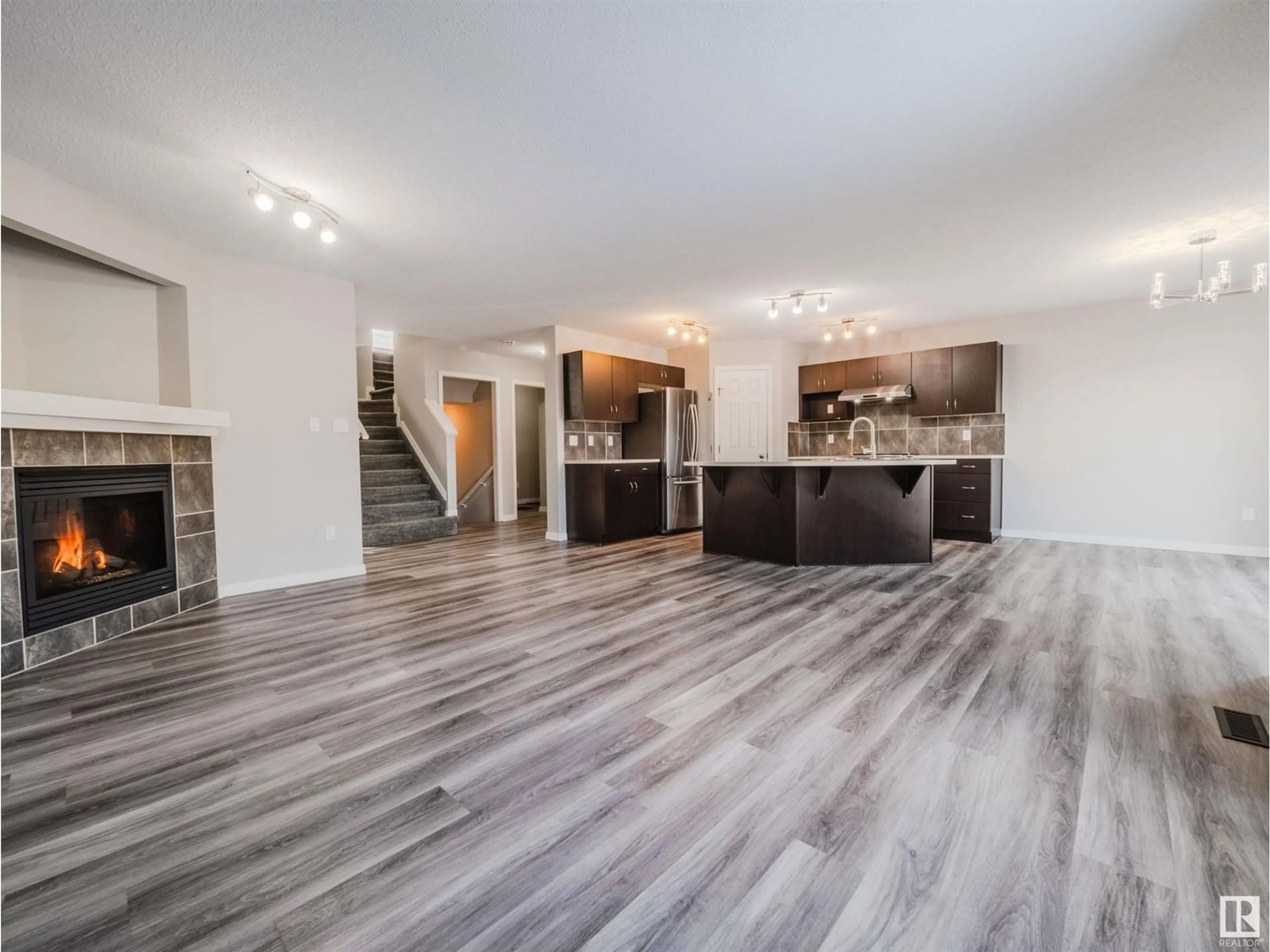 Open concept kitchen, wood/laminate floor for 1134 HAYS DR NW, Edmonton Alberta T6M0M2