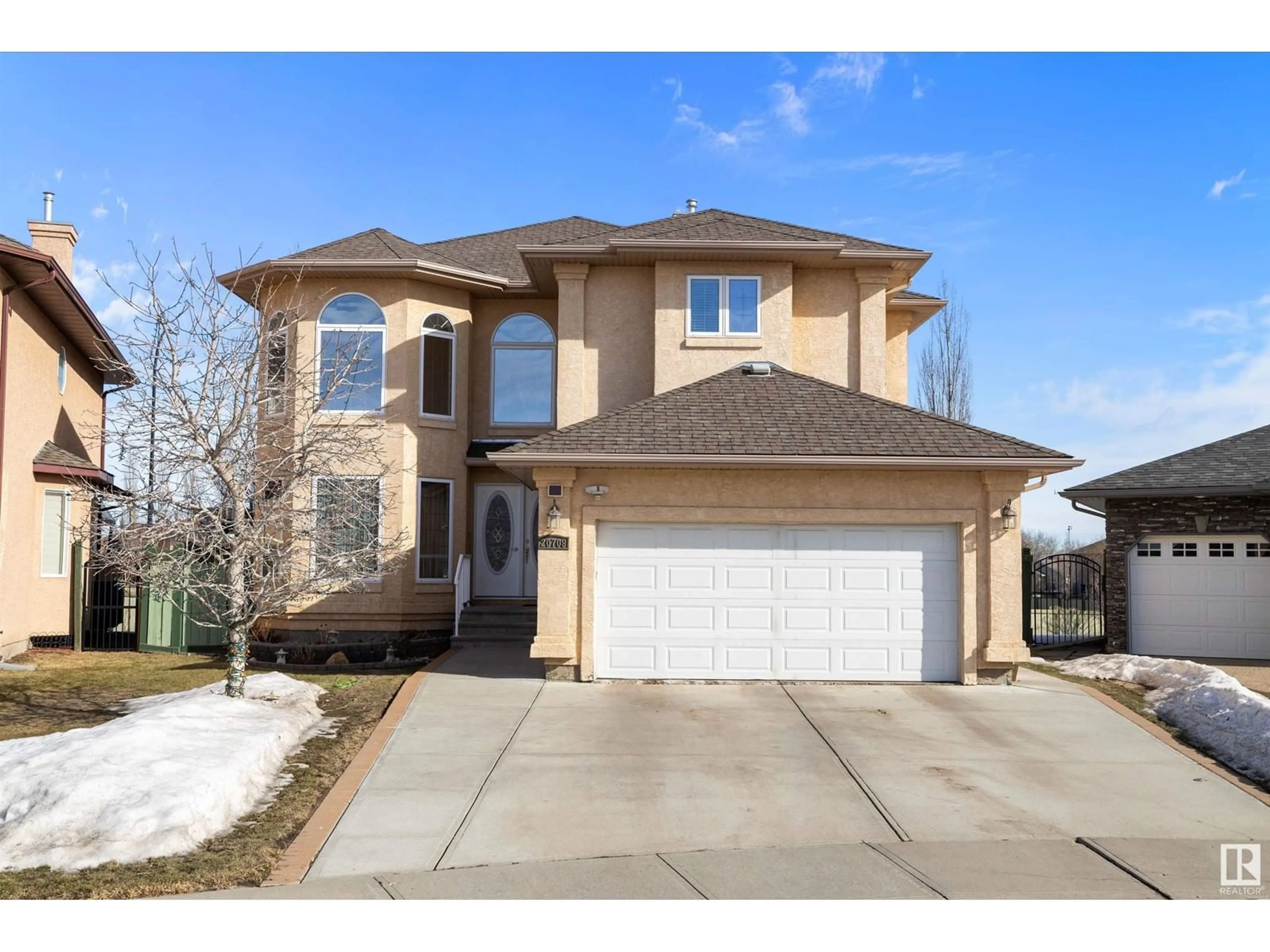 Home with brick exterior material, street for 20708 90 AV NW, Edmonton Alberta T5T1T4