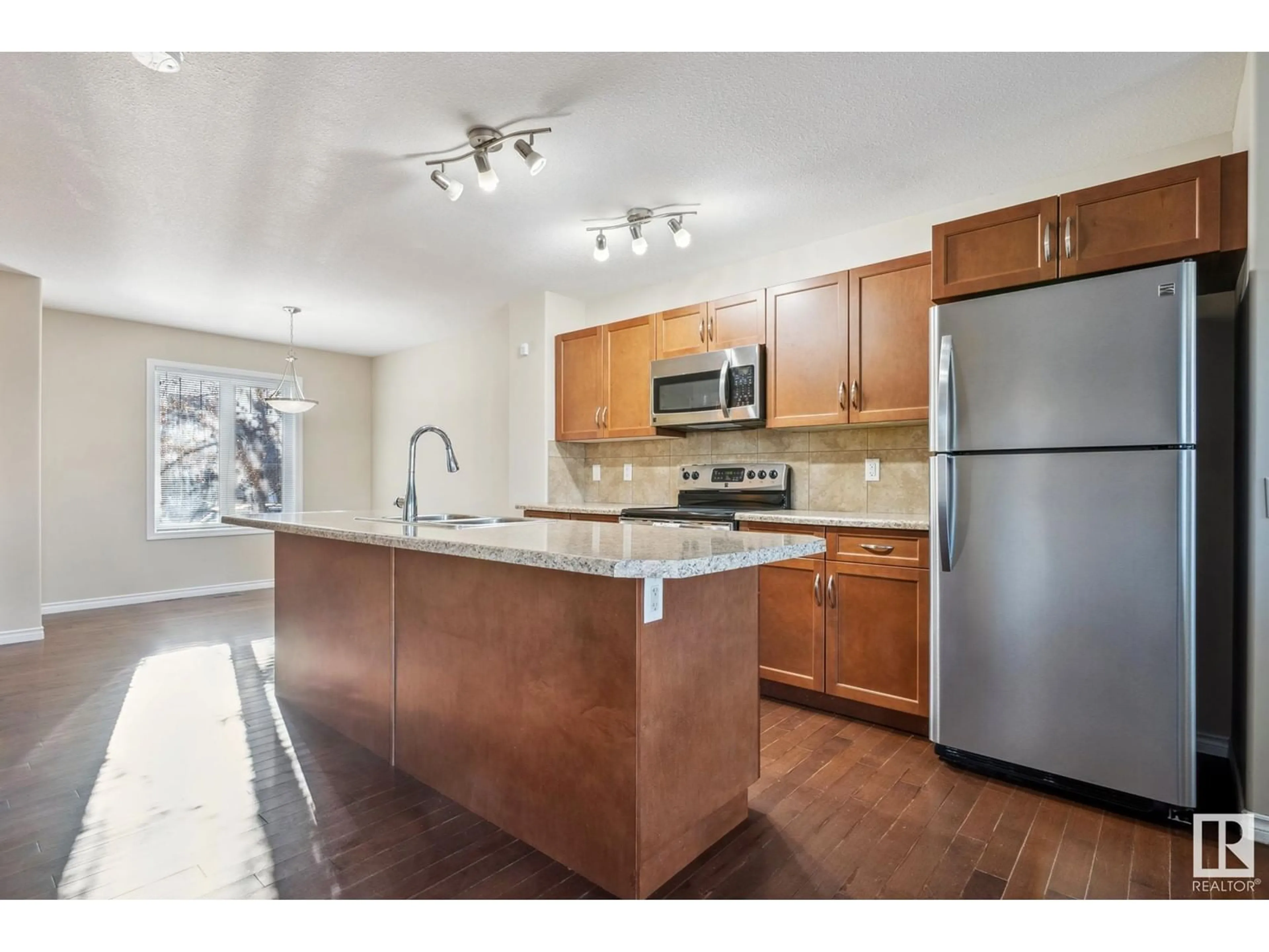 Open concept kitchen, unknown for 418 SECORD BV NW, Edmonton Alberta T5T4N7