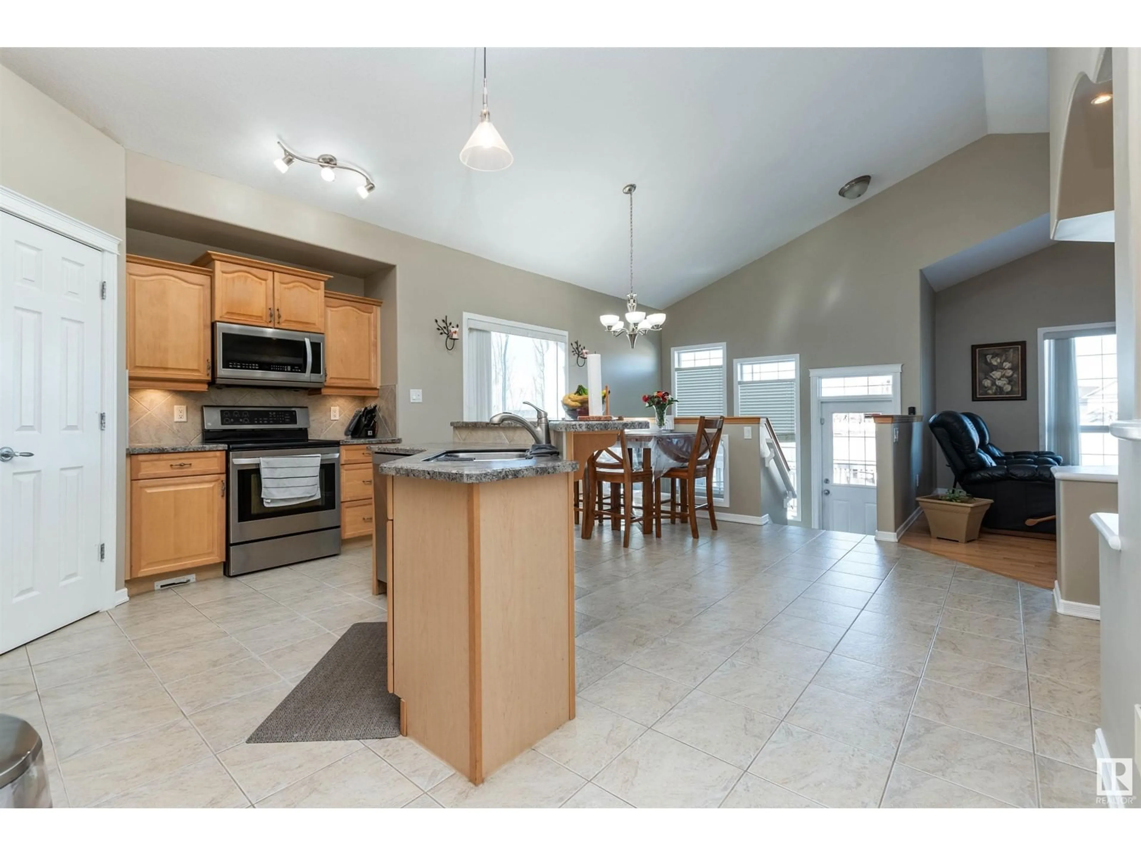 Open concept kitchen, ceramic/tile floor for 20424 60 AV NW, Edmonton Alberta T6M2Z5