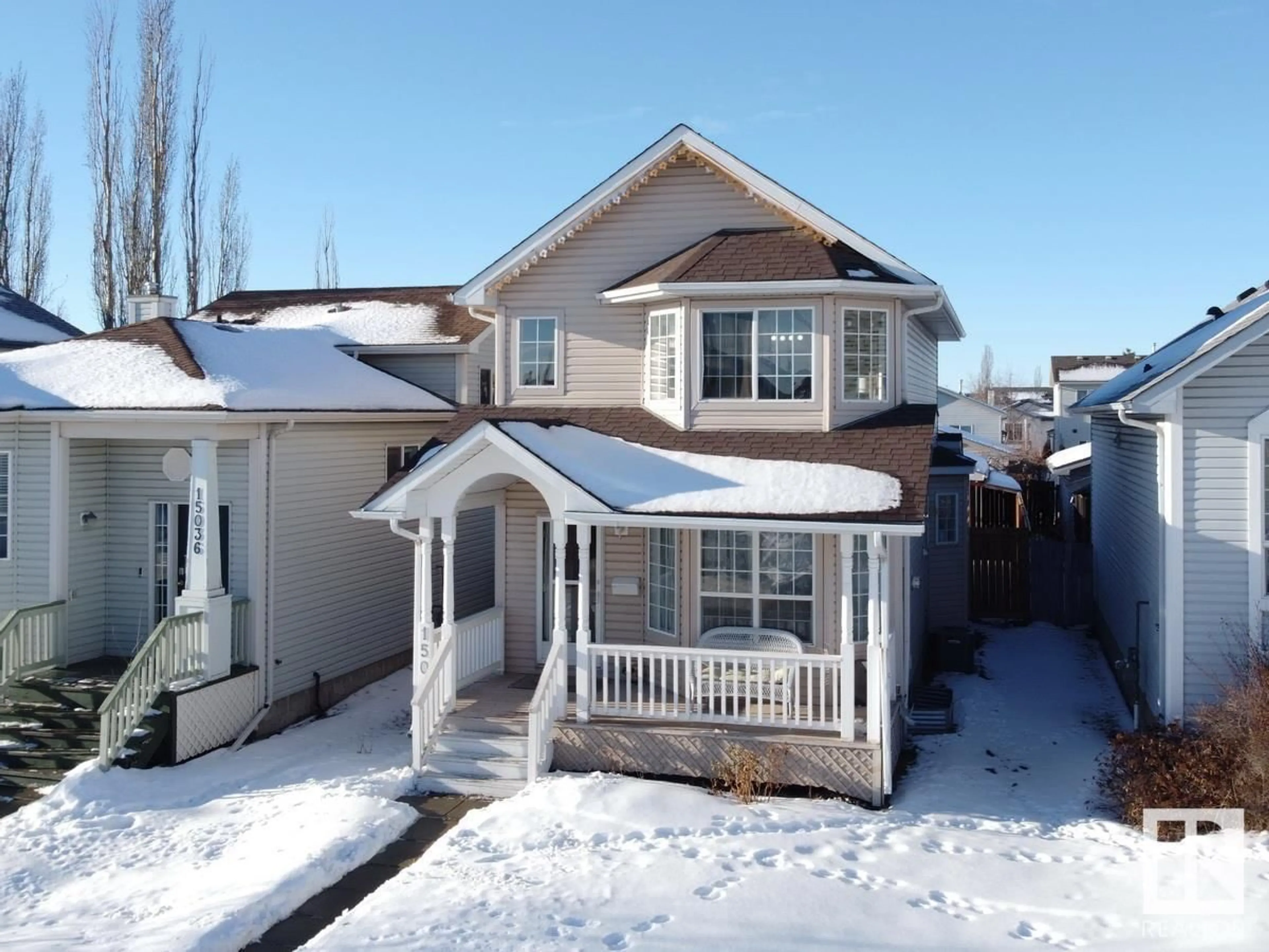 Home with vinyl exterior material, street for 15040 131 ST NW, Edmonton Alberta T6V1K3