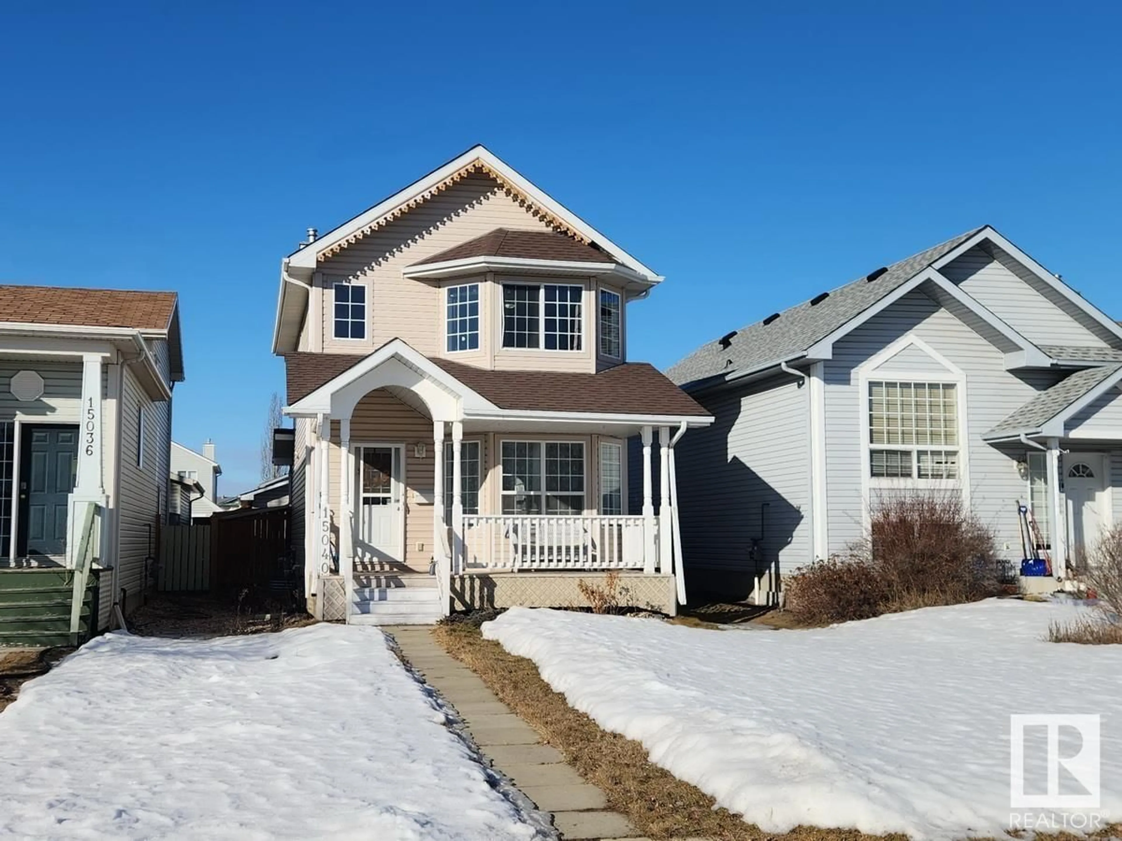 Home with vinyl exterior material, street for 15040 131 ST NW, Edmonton Alberta T6V1K3