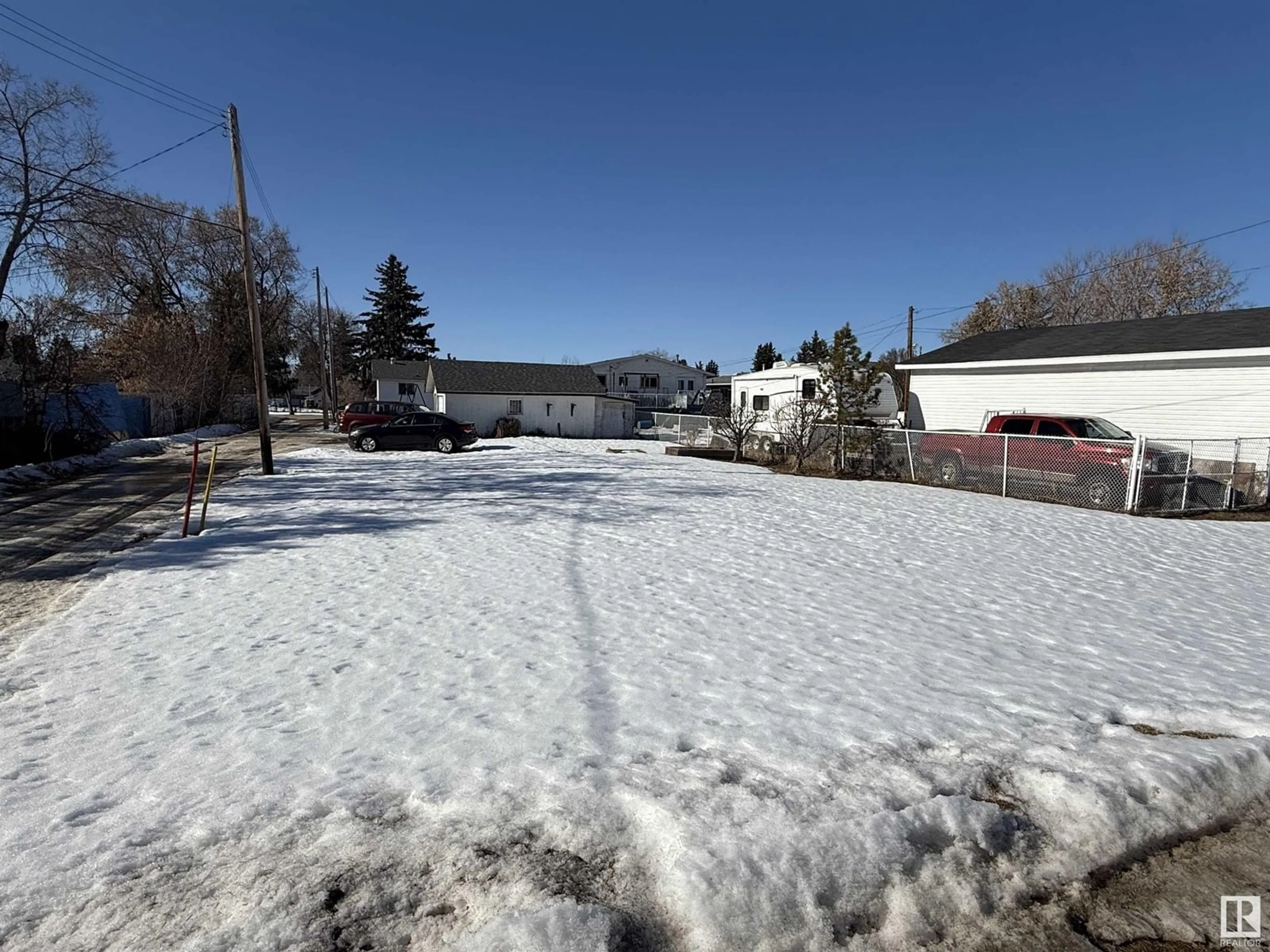 A pic from outside/outdoor area/front of a property/back of a property/a pic from drone, mountain view for 5115 46 ST, Barrhead Alberta T7N1H8