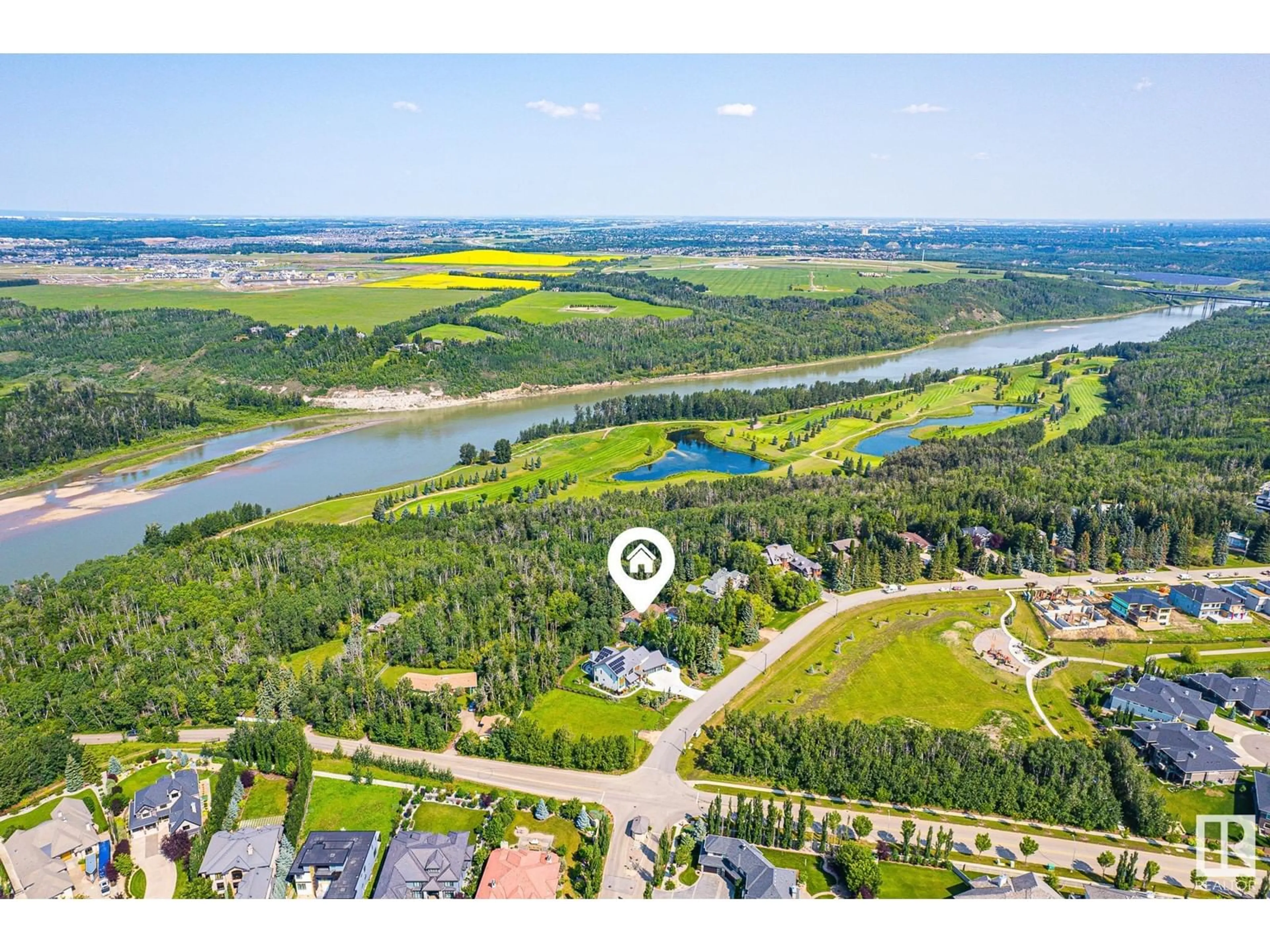 A pic from outside/outdoor area/front of a property/back of a property/a pic from drone, water/lake/river/ocean view for 108 WINDERMERE DR, Edmonton Alberta T6W0S4