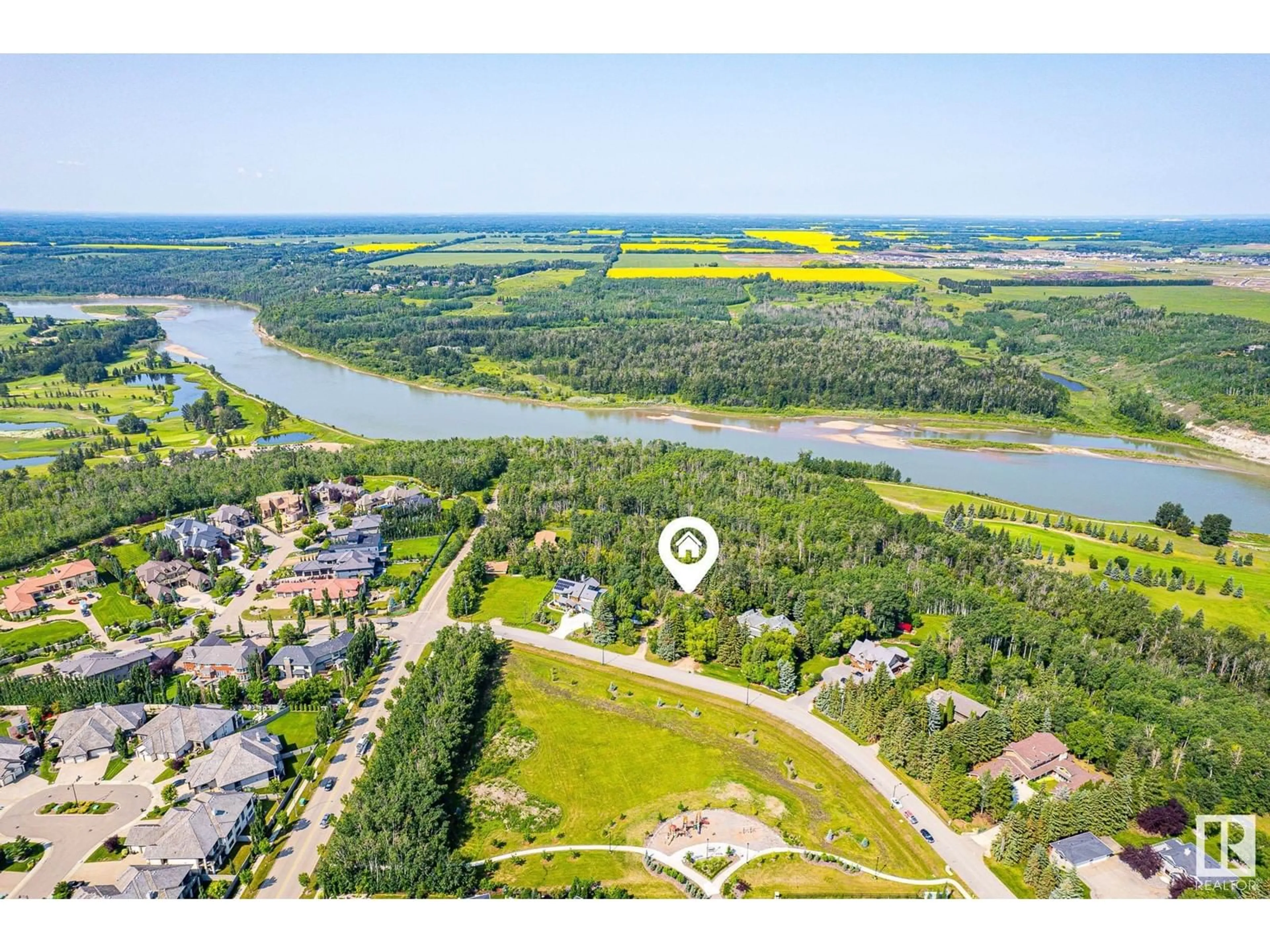A pic from outside/outdoor area/front of a property/back of a property/a pic from drone, water/lake/river/ocean view for 108 WINDERMERE DR, Edmonton Alberta T6W0S4