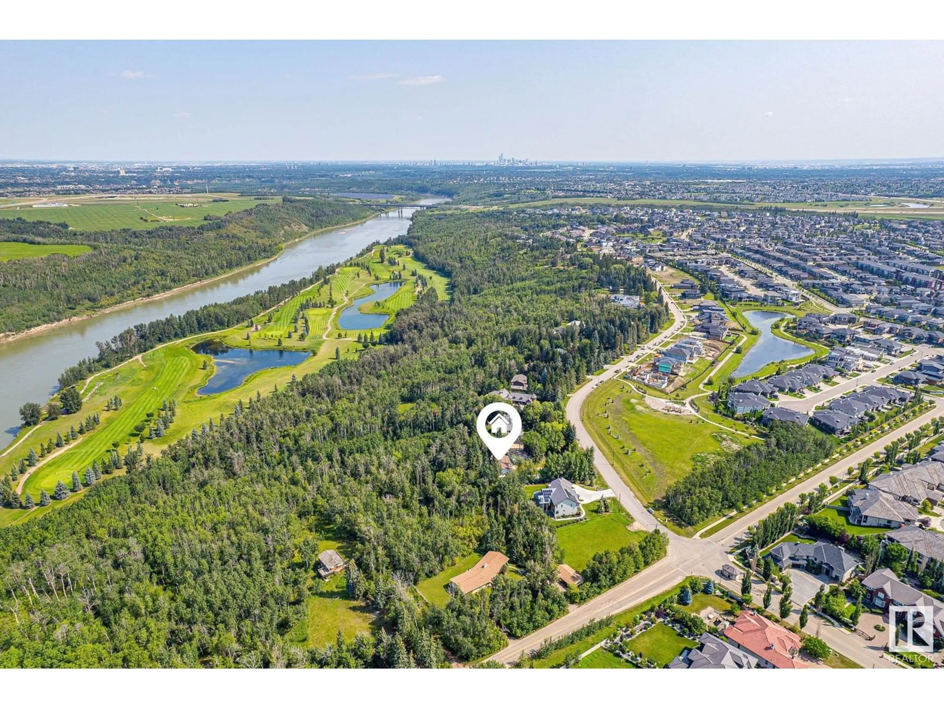 A pic from outside/outdoor area/front of a property/back of a property/a pic from drone, water/lake/river/ocean view for 108 WINDERMERE DR, Edmonton Alberta T6W0S4