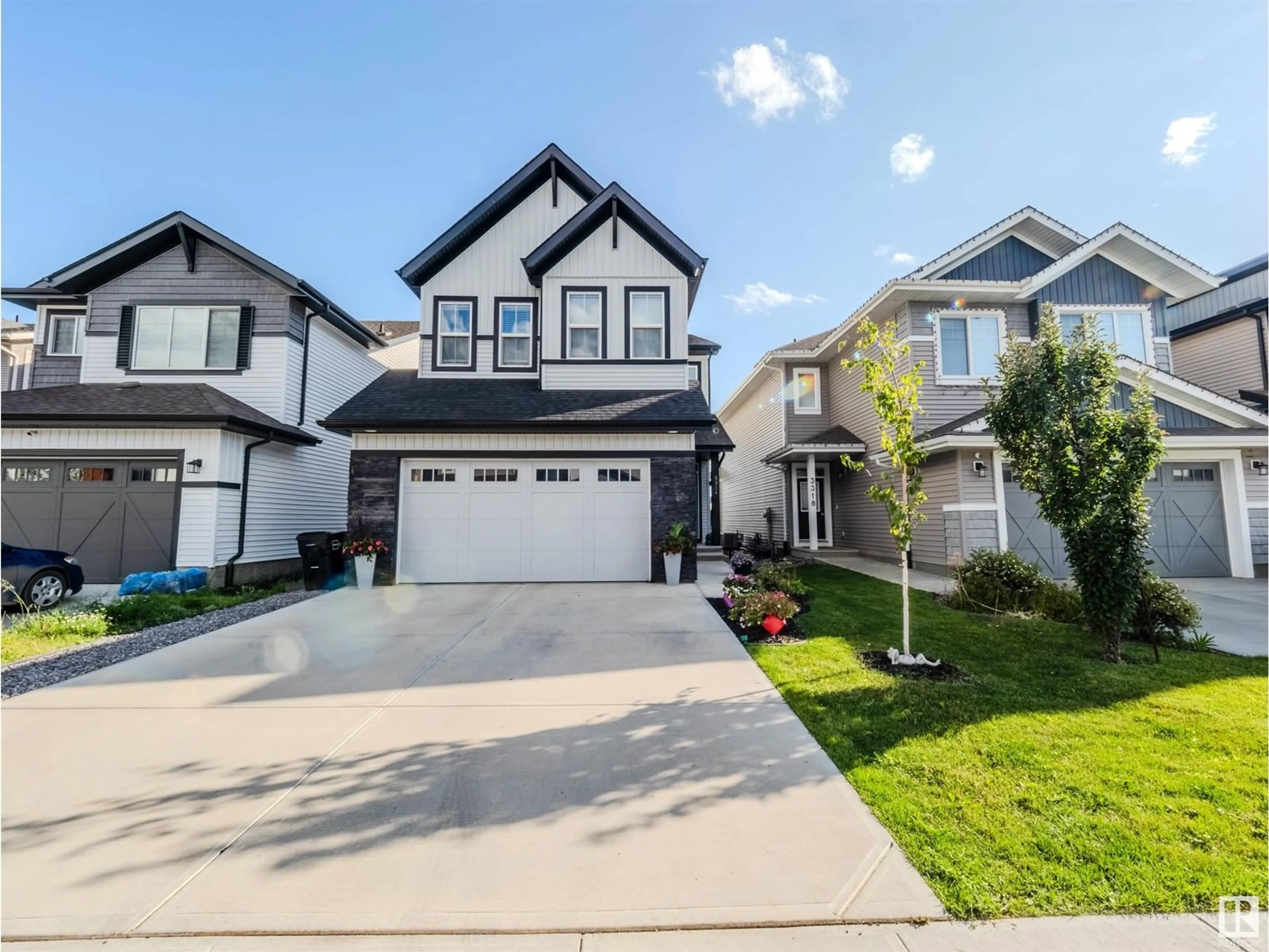 Home with vinyl exterior material, street for 3314 PARKER LO SW, Edmonton Alberta T6W4C2