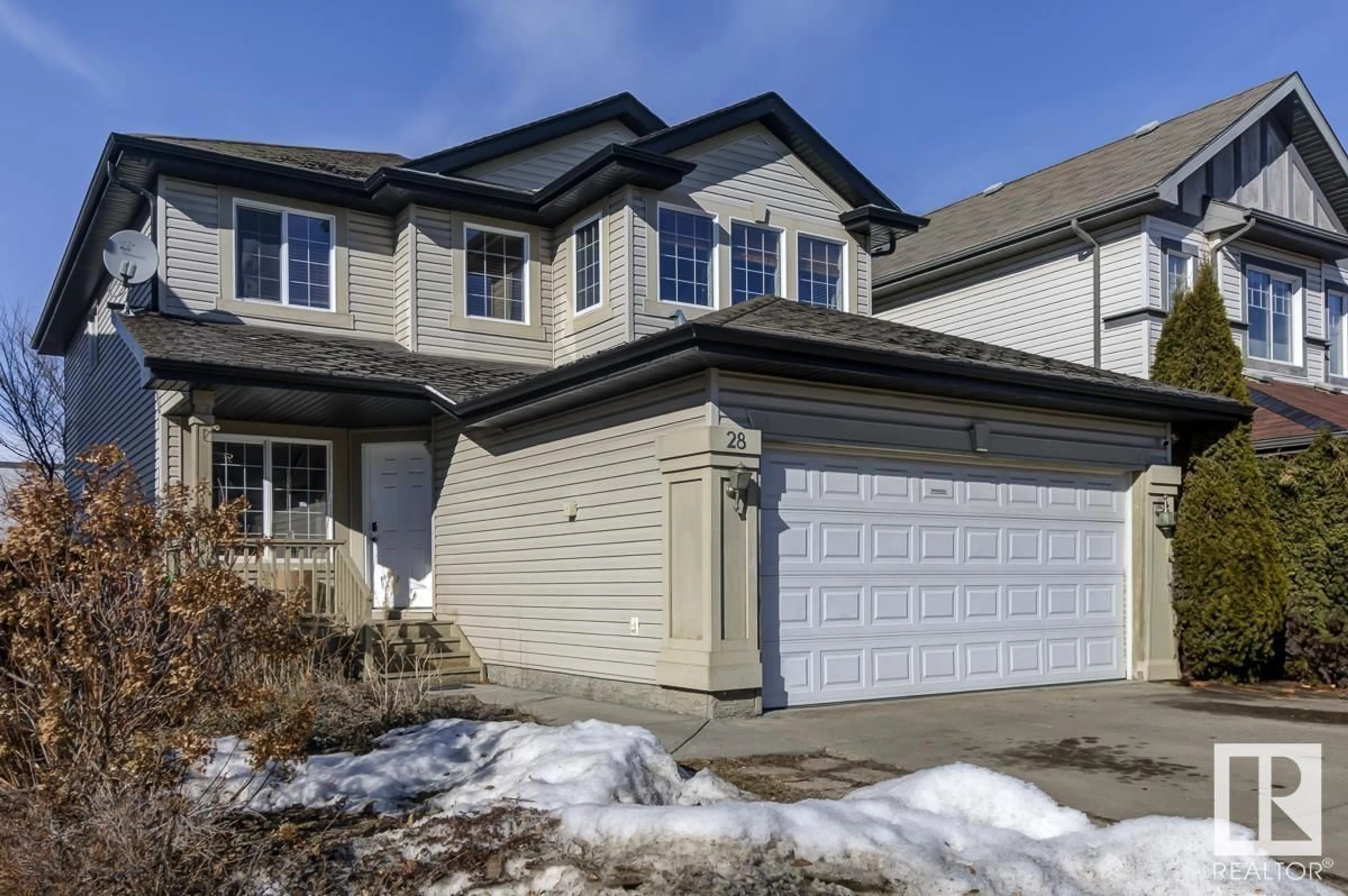 Home with vinyl exterior material, street for 28 BECKER CR, Fort Saskatchewan Alberta T8L0C1