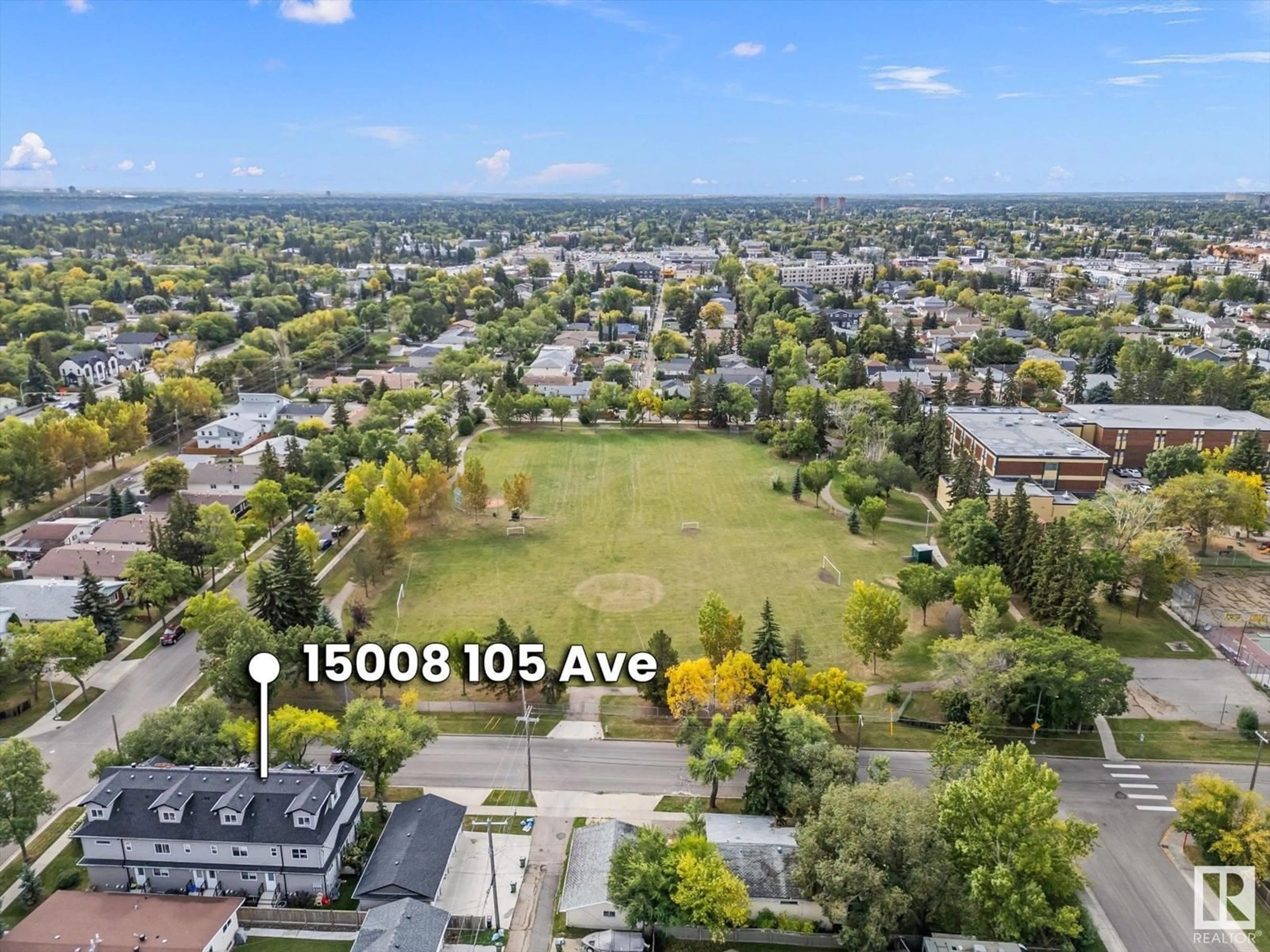 A pic from outside/outdoor area/front of a property/back of a property/a pic from drone, mountain view for 15008 105 AV NW, Edmonton Alberta T5P4P1