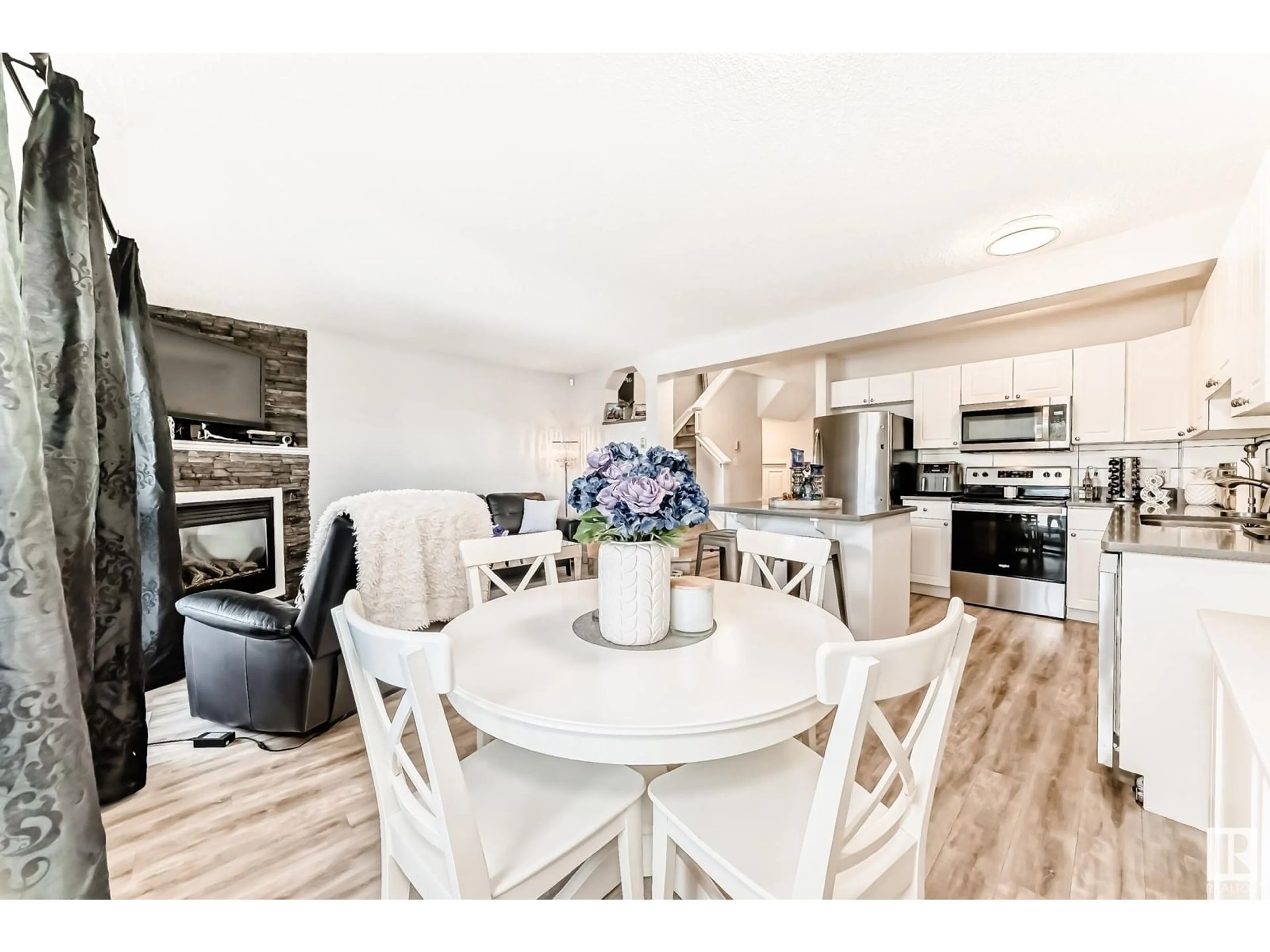 Open concept kitchen, wood/laminate floor for 33 NEVIS CL, St. Albert Alberta T8N0R7