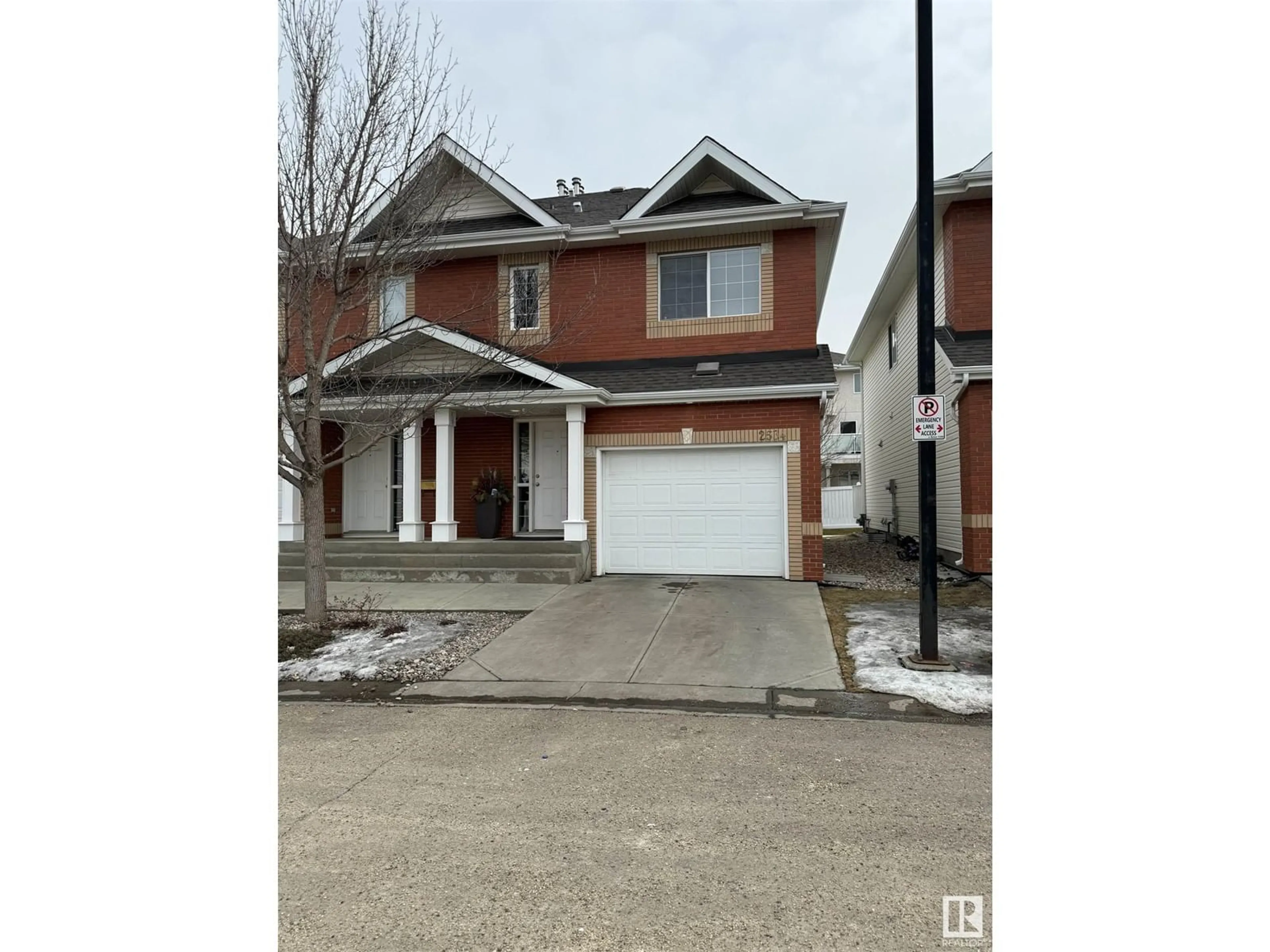 Home with brick exterior material, street for 2534 Rabbit Hill RD NW, Edmonton Alberta T6R2Y9