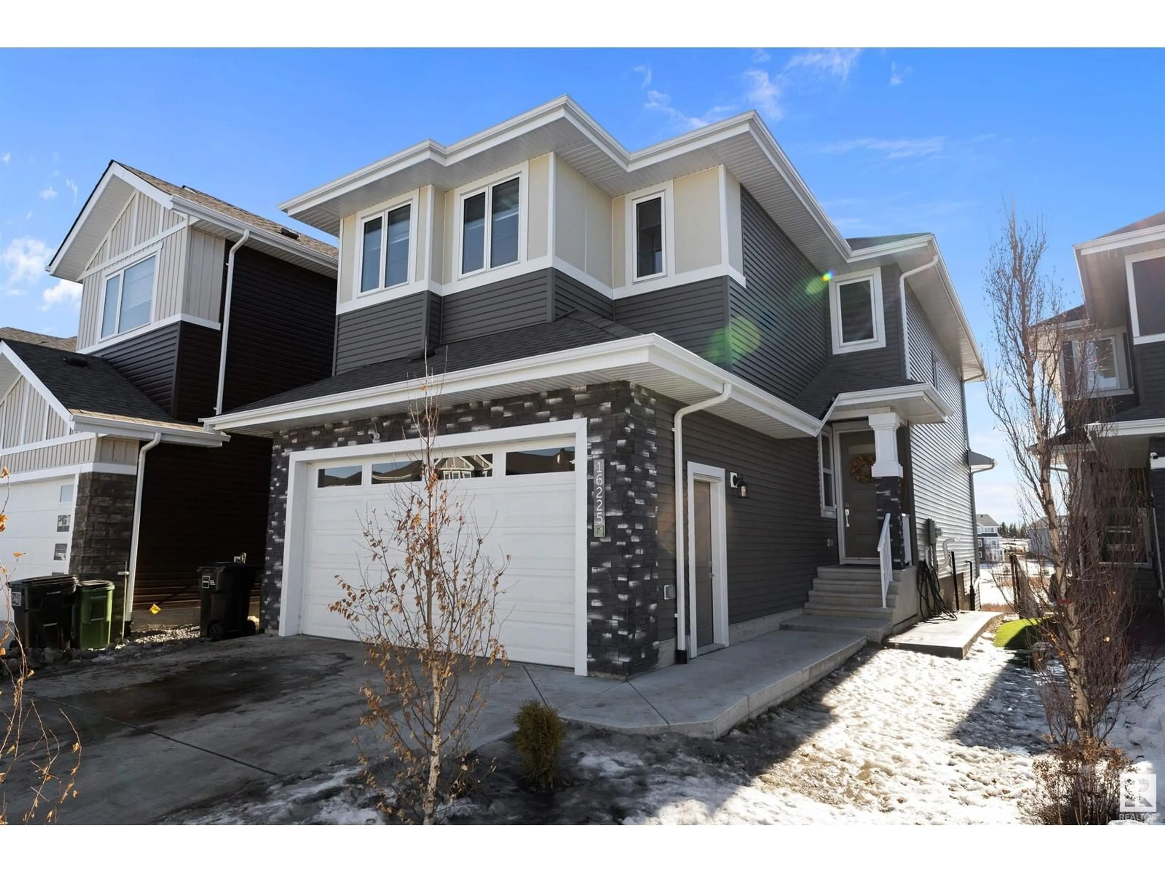 Home with vinyl exterior material, street for 16225 32 AV SW SW, Edmonton Alberta T6W4P2