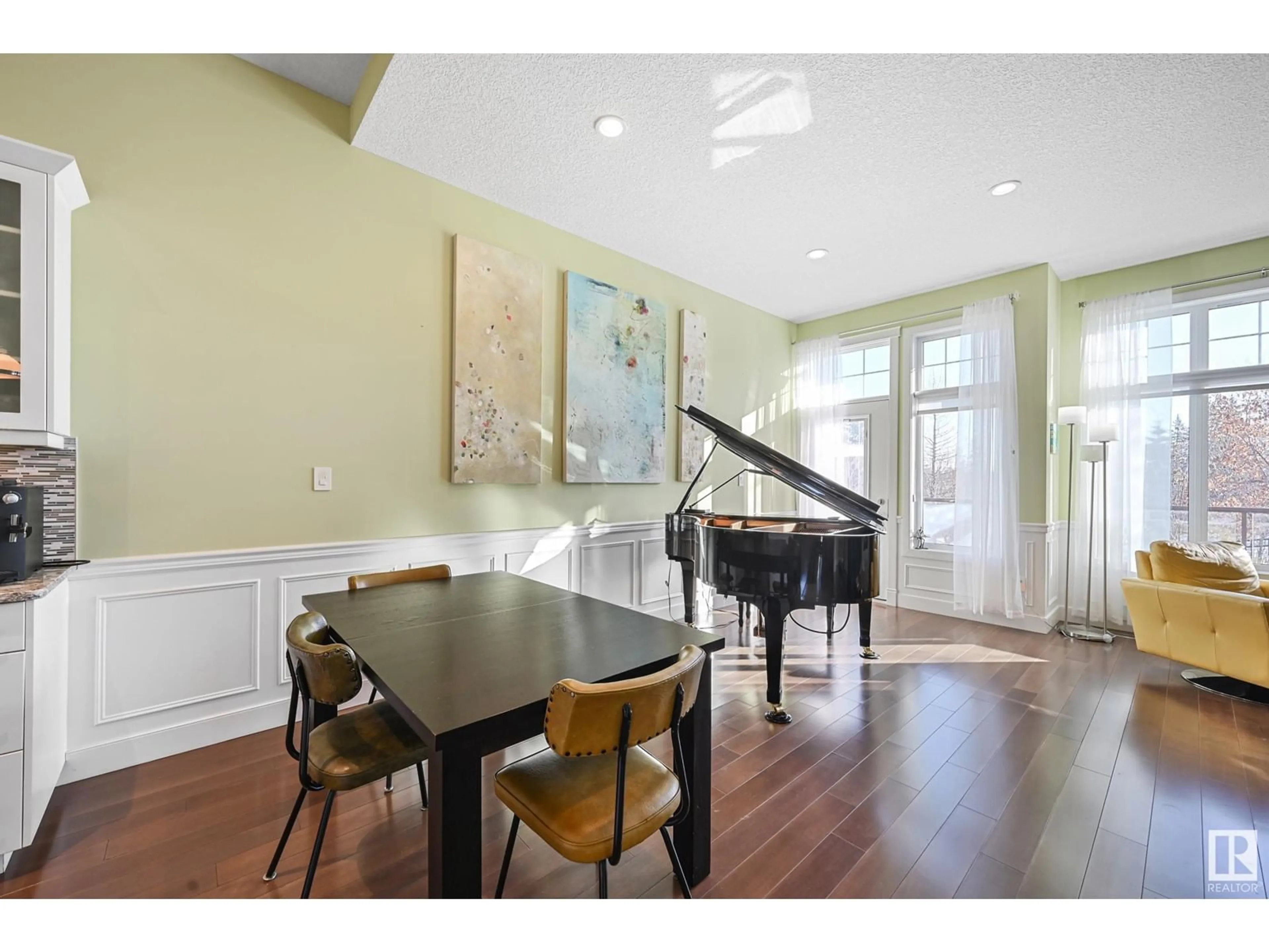 Dining room, wood/laminate floor for #1 7570 MAY CM NW, Edmonton Alberta T6R0G9