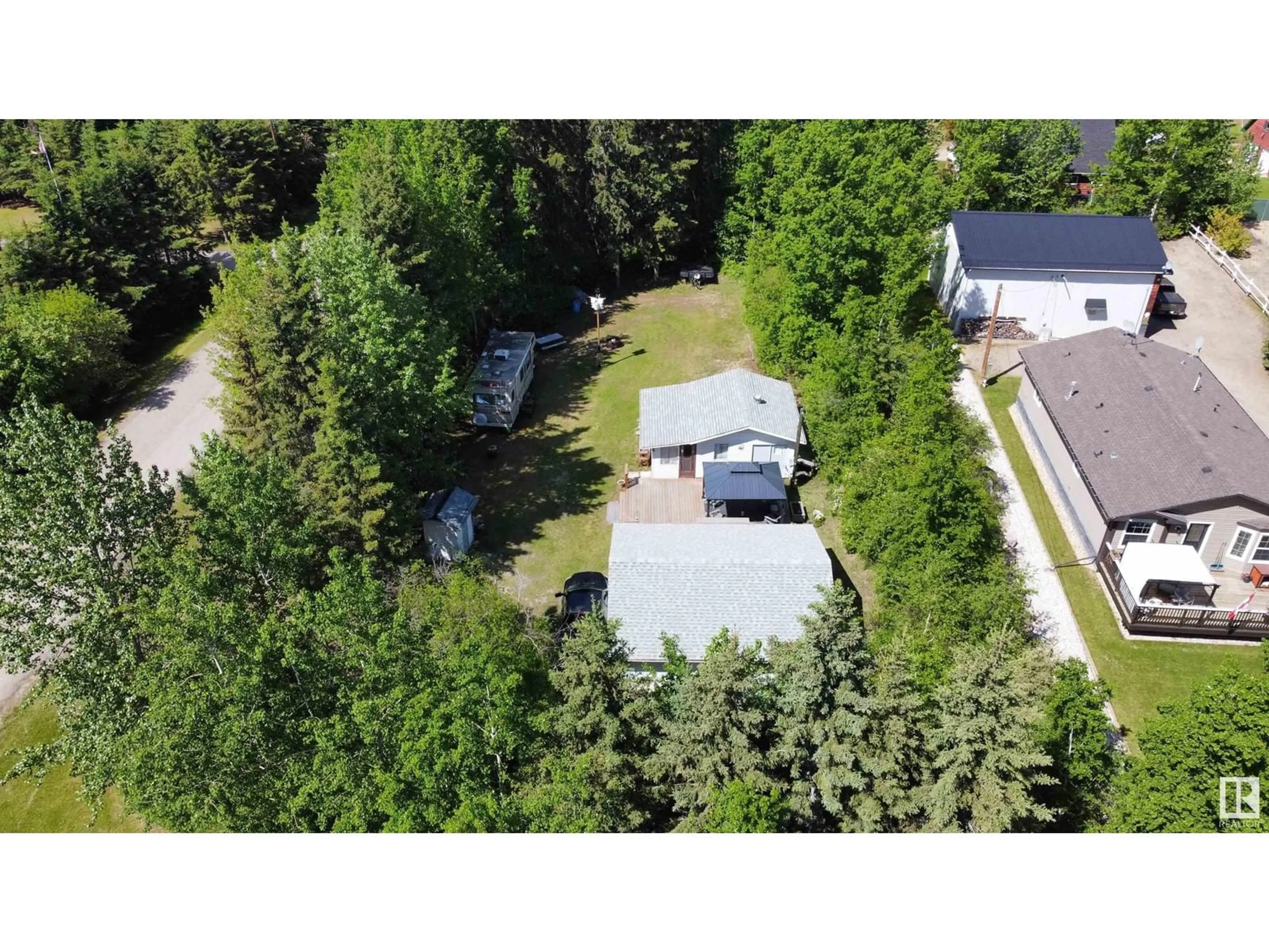 A pic from outside/outdoor area/front of a property/back of a property/a pic from drone, unknown for 2 - 4418 HWY 633, Rural Lac Ste. Anne County Alberta T0E0L0