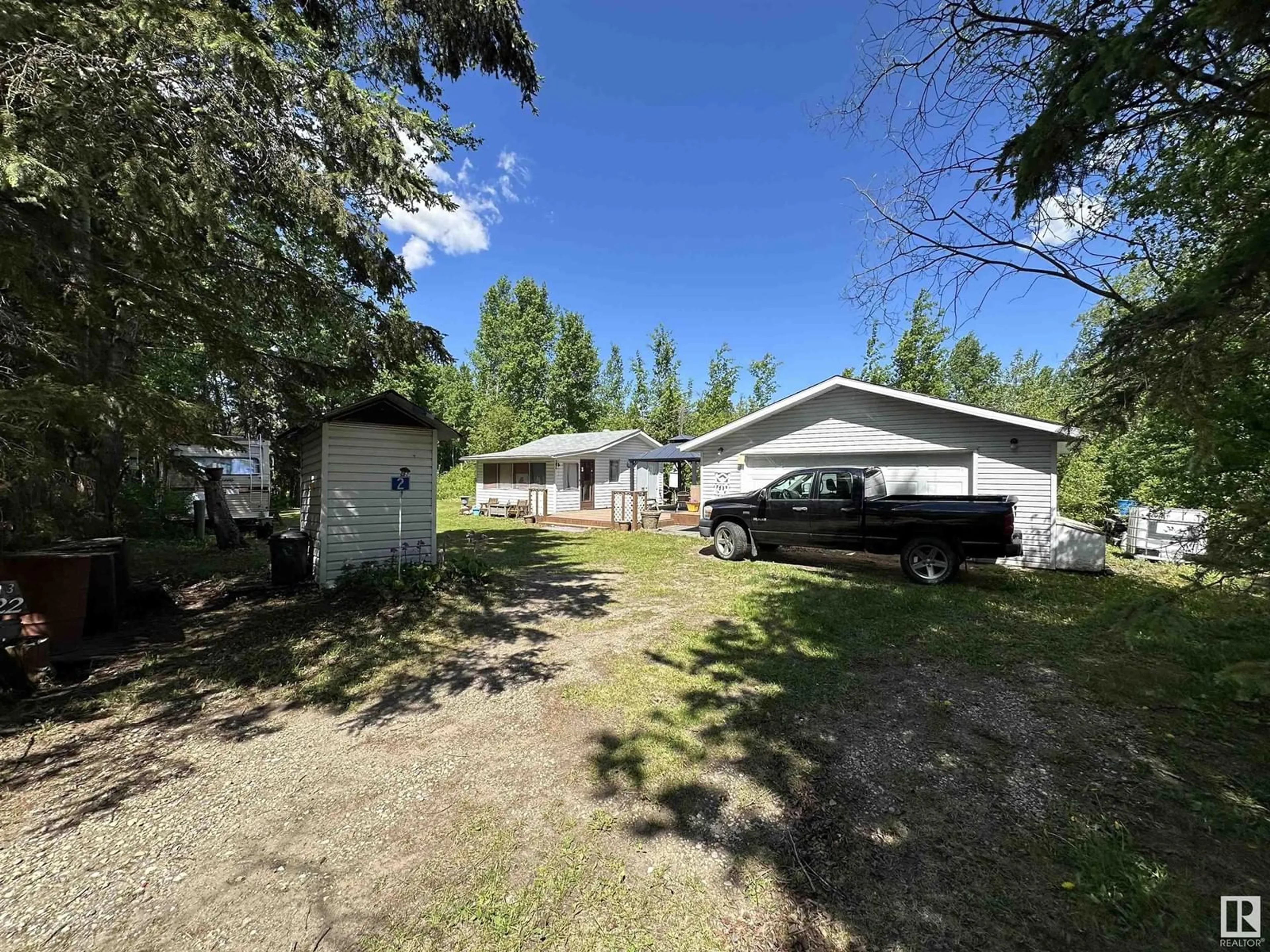 A pic from outside/outdoor area/front of a property/back of a property/a pic from drone, unknown for 2 - 4418 HWY 633, Rural Lac Ste. Anne County Alberta T0E0L0