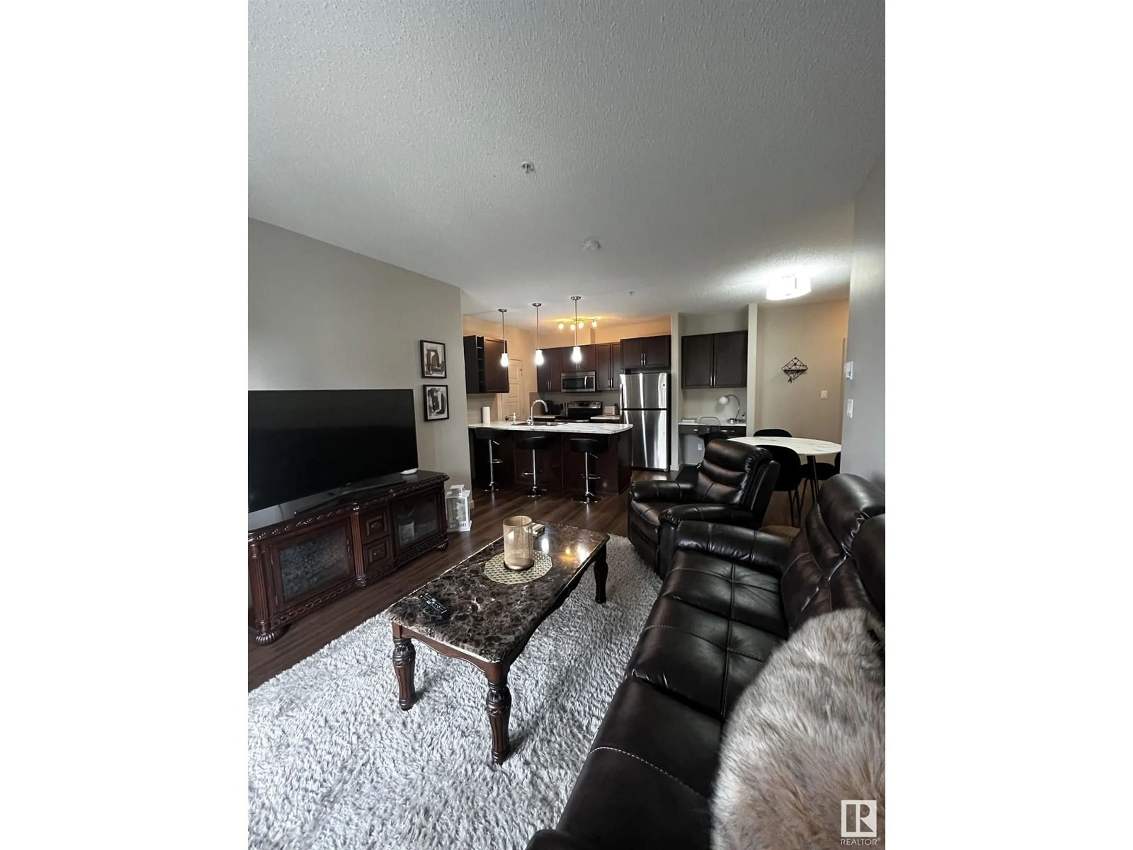 Living room with furniture, unknown for #305 320 AMBLESIDE LI SW, Edmonton Alberta T6W2Z9