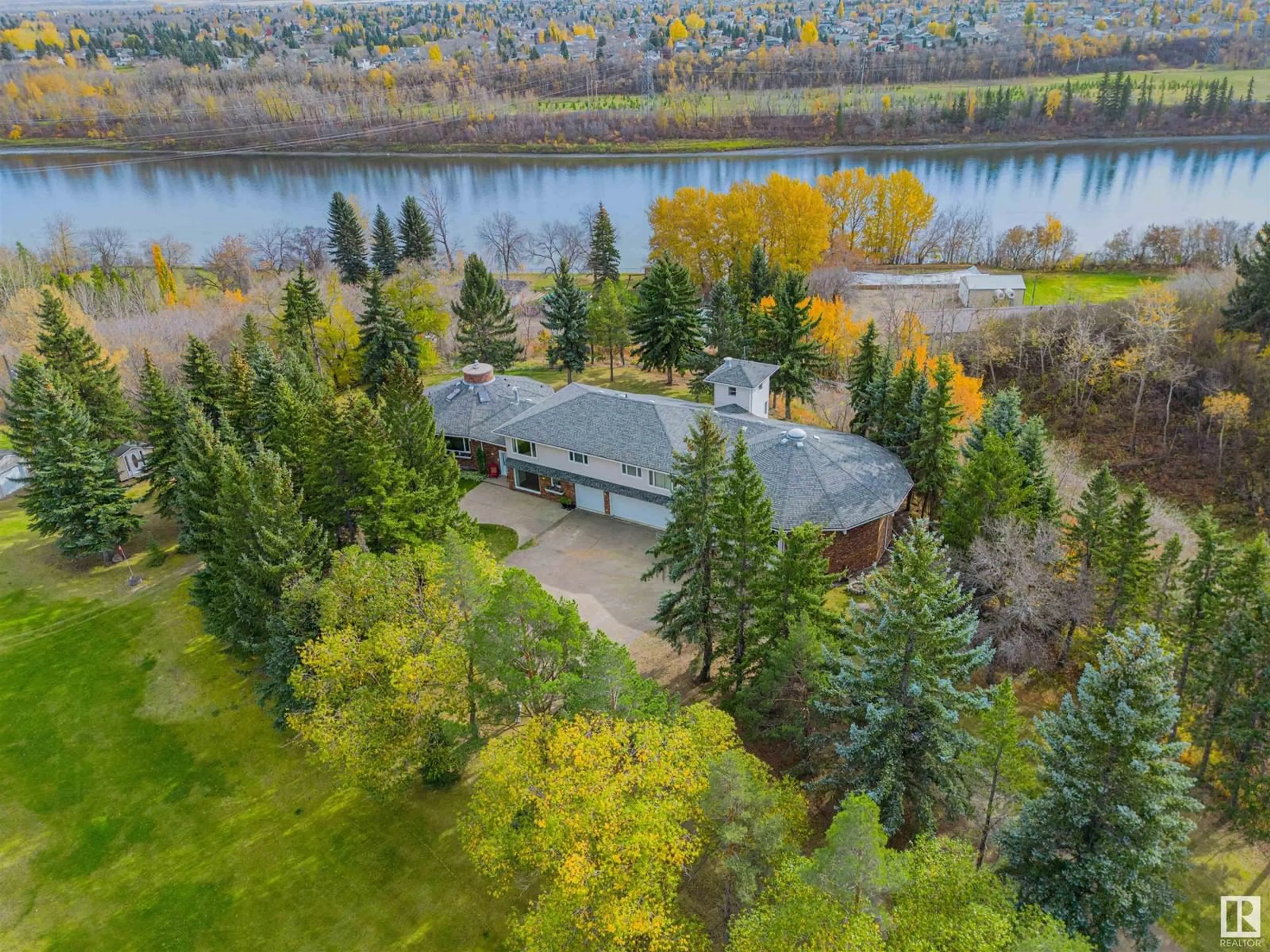 A pic from outside/outdoor area/front of a property/back of a property/a pic from drone, water/lake/river/ocean view for 23022 LAMOUREUX DR, Rural Sturgeon County Alberta T8L2T2