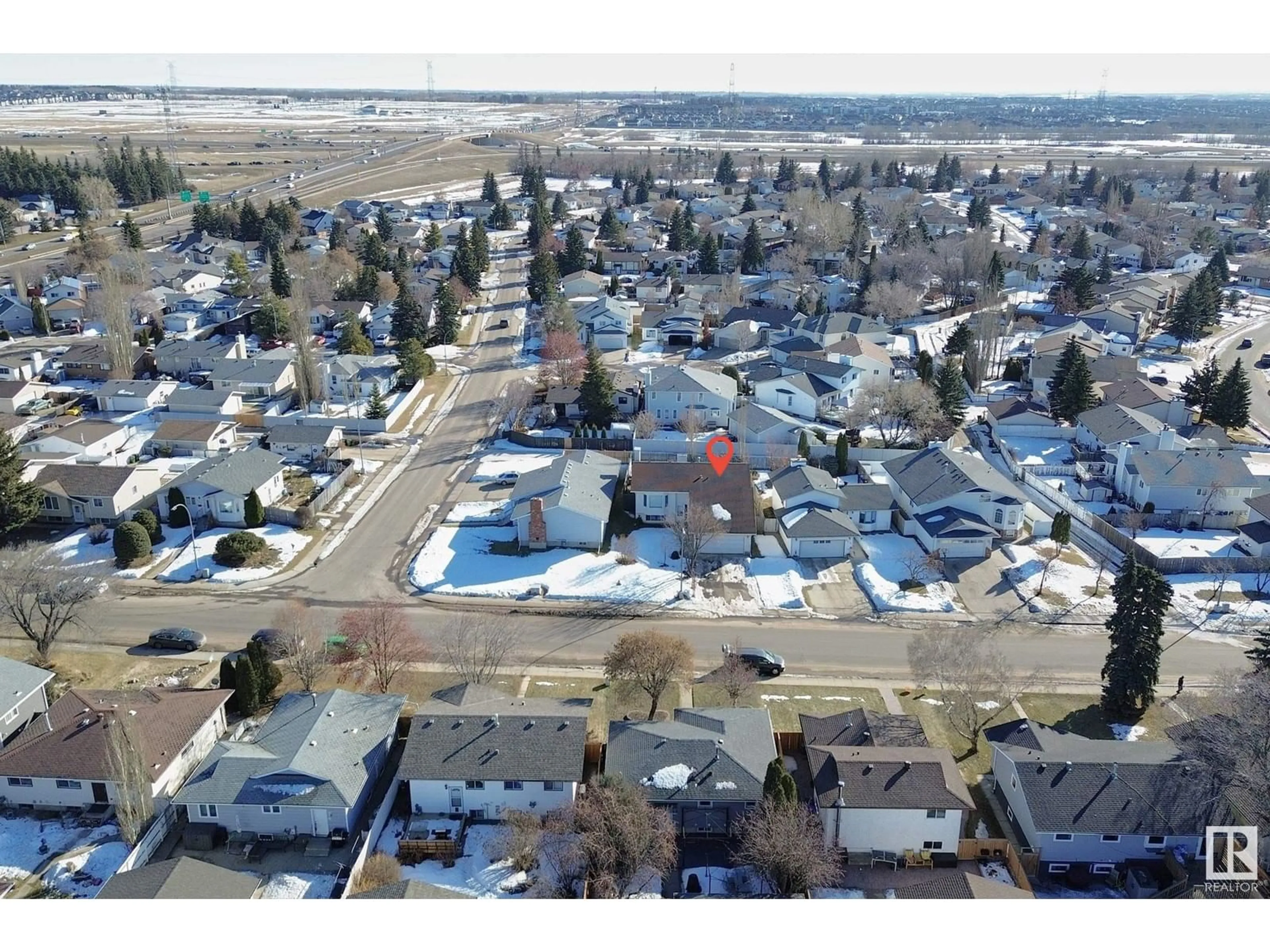 A pic from outside/outdoor area/front of a property/back of a property/a pic from drone, street for 5207 13 AV NW, Edmonton Alberta T6L6T6