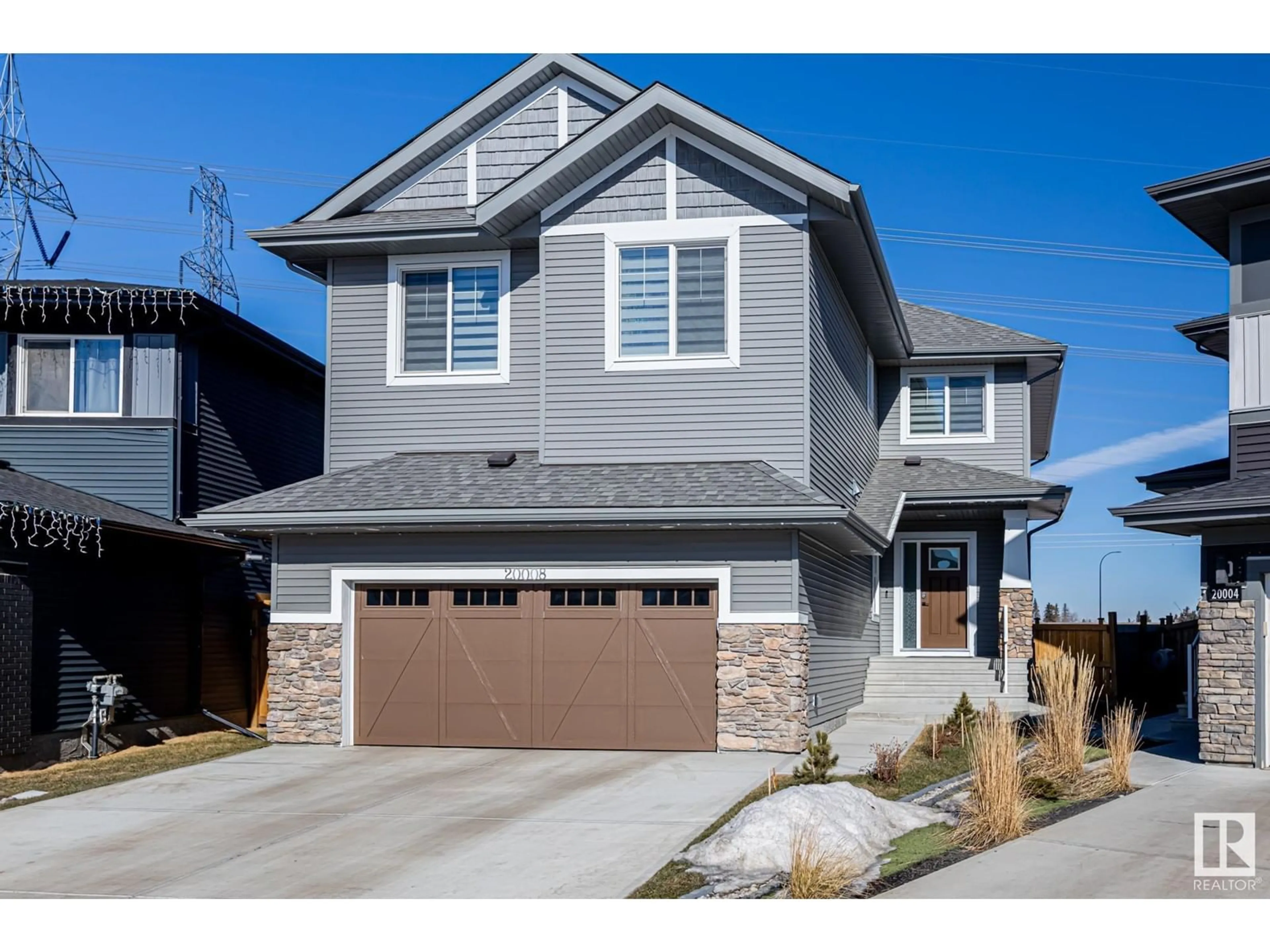 Home with vinyl exterior material, street for 20008 29 AV NW, Edmonton Alberta T6M0W8