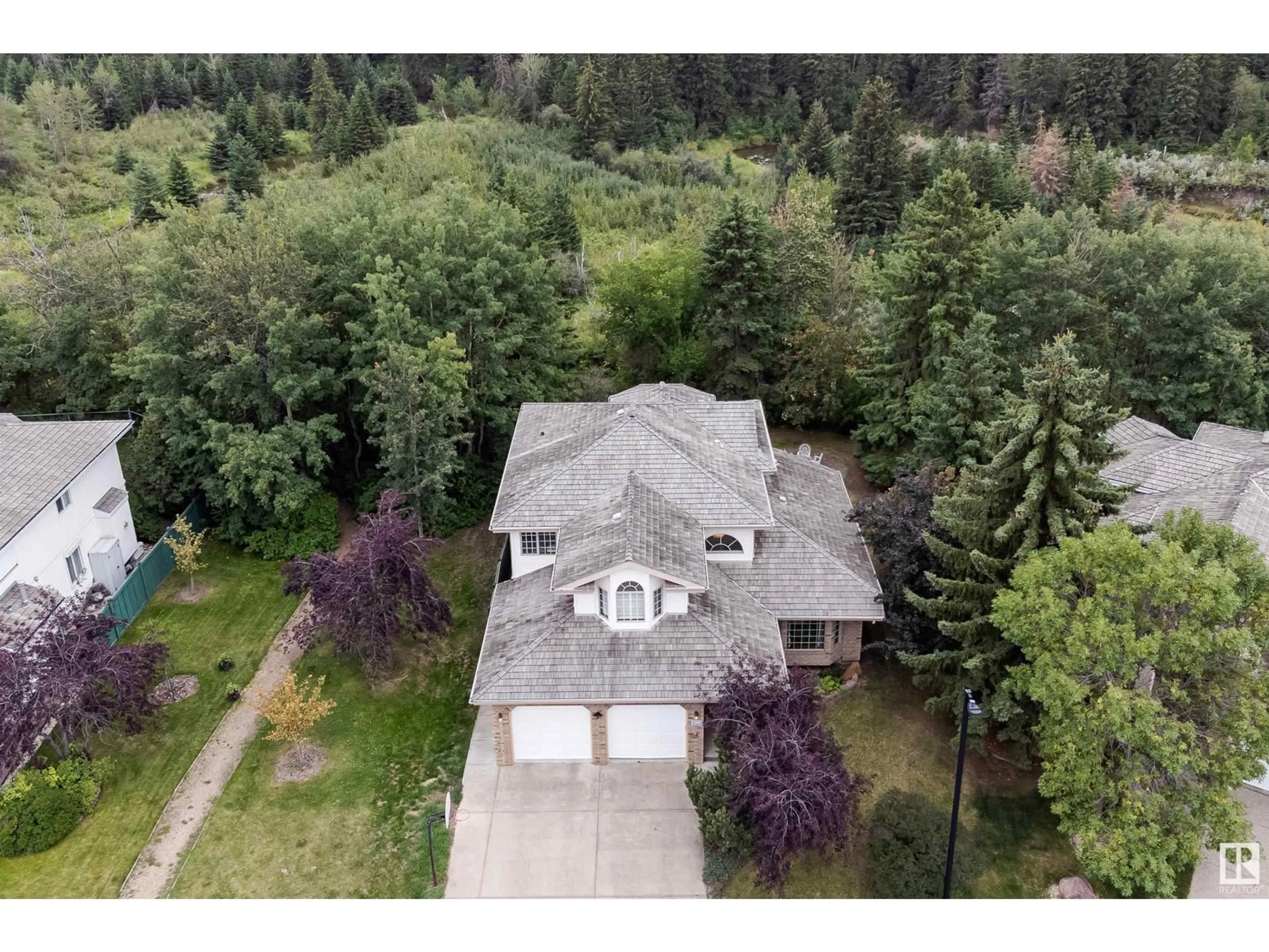 A pic from outside/outdoor area/front of a property/back of a property/a pic from drone, unknown for 911 BLACKETT WD SW, Edmonton Alberta T6W1A9