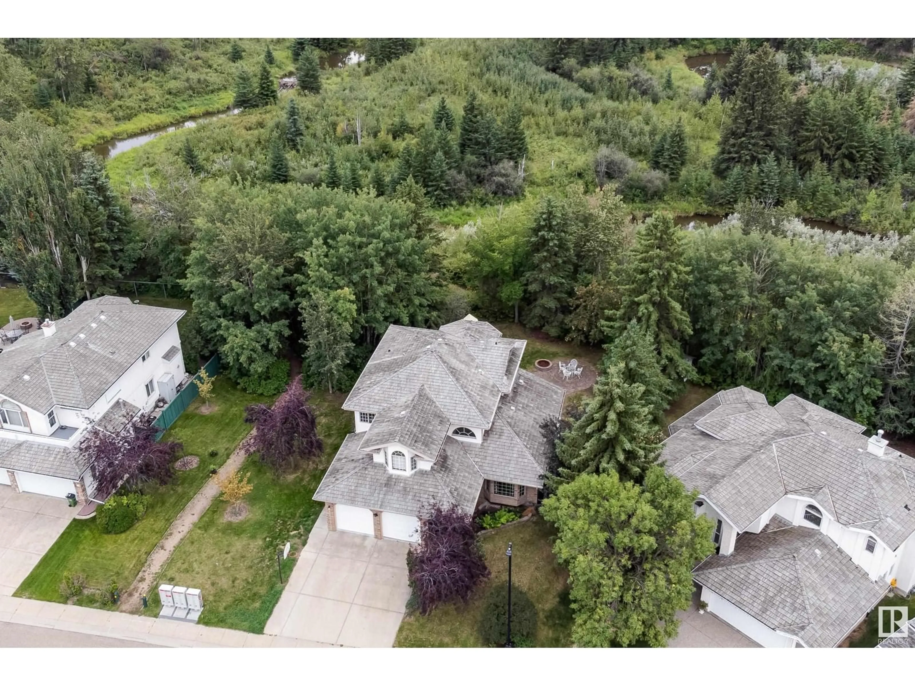 A pic from outside/outdoor area/front of a property/back of a property/a pic from drone, unknown for 911 BLACKETT WD SW, Edmonton Alberta T6W1A9