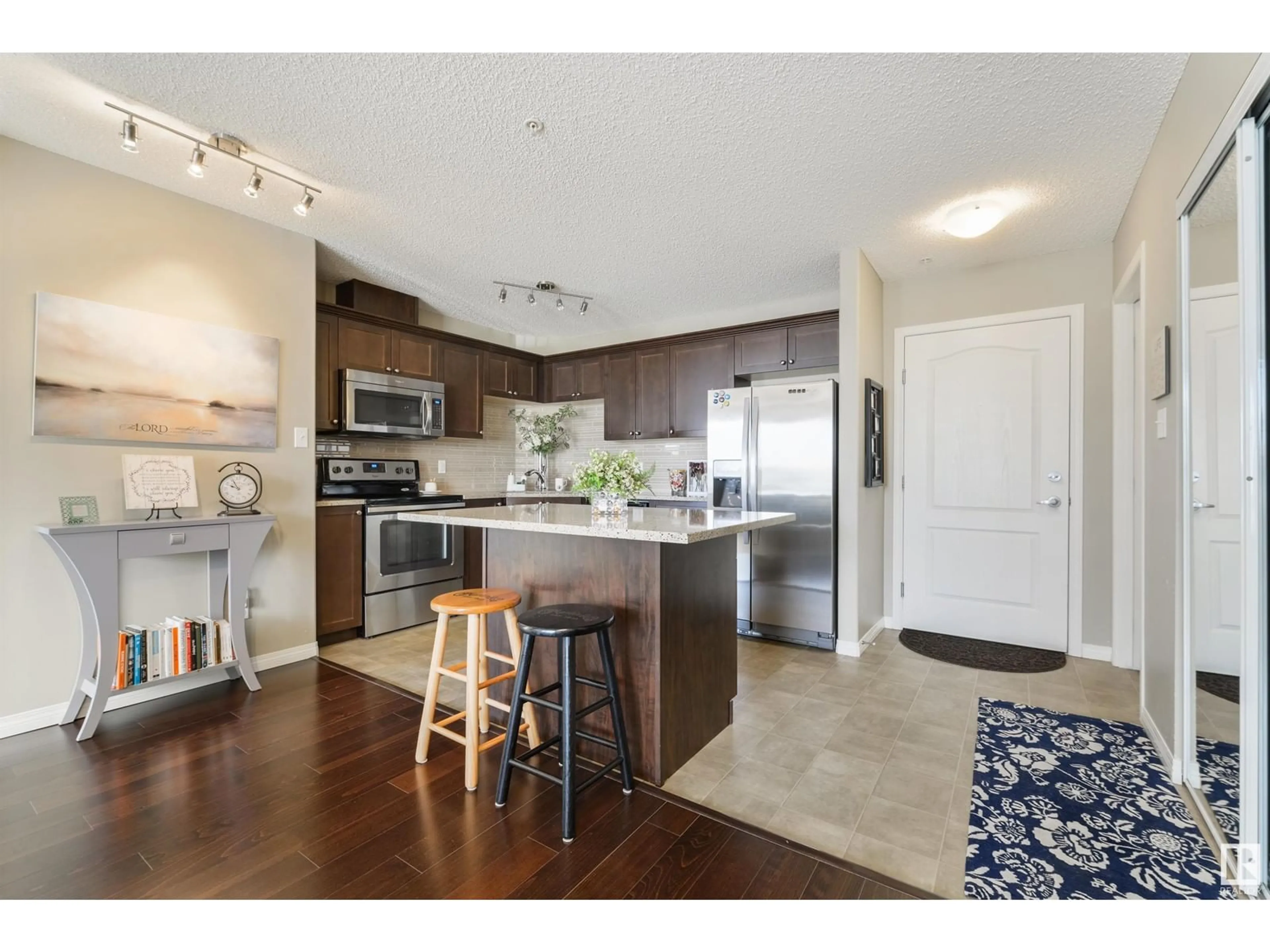 Open concept kitchen, unknown for #116 1520 Hammond Gate NW, Edmonton Alberta T6M0J4