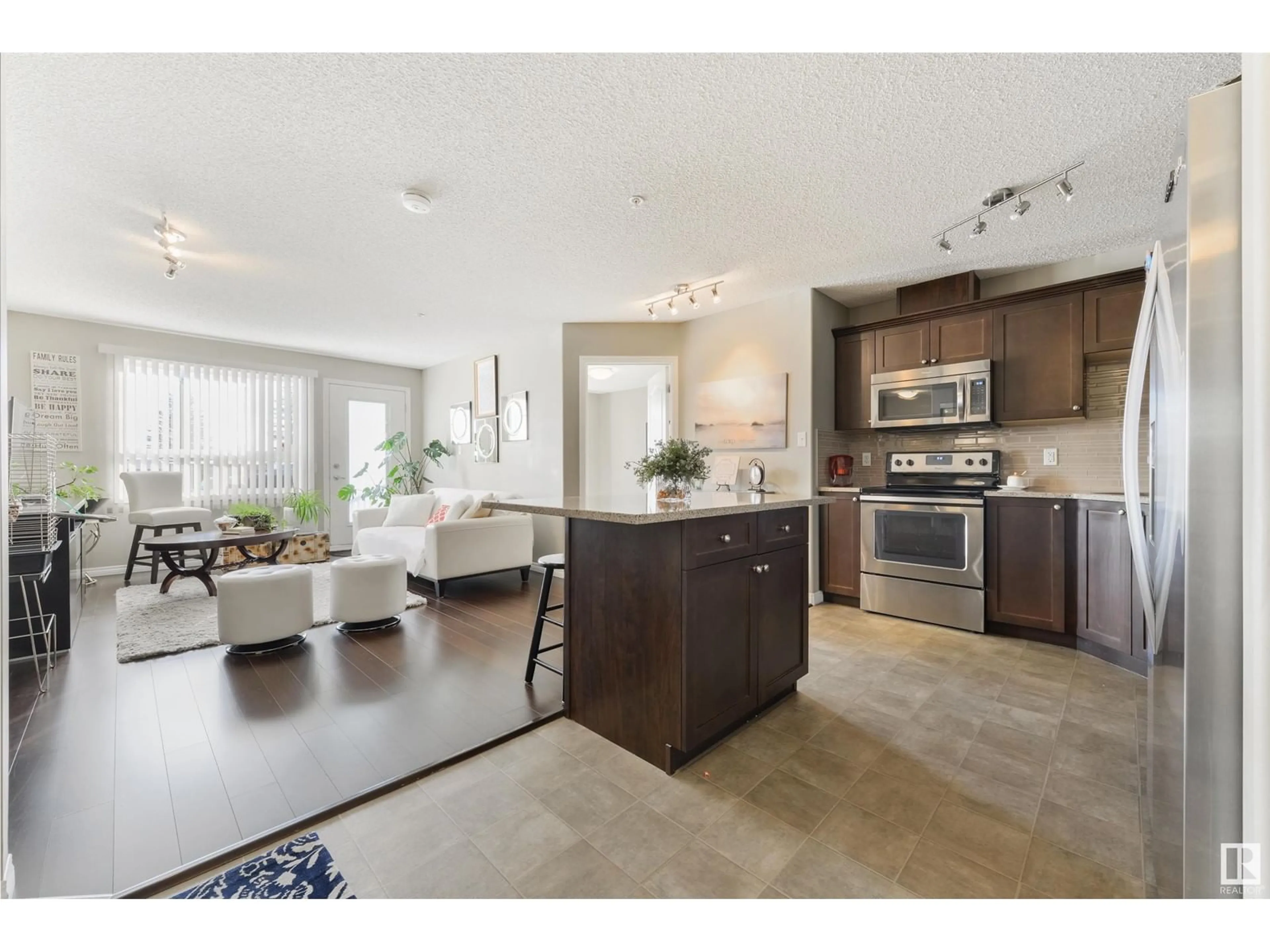 Open concept kitchen, ceramic/tile floor for #116 1520 Hammond Gate NW, Edmonton Alberta T6M0J4