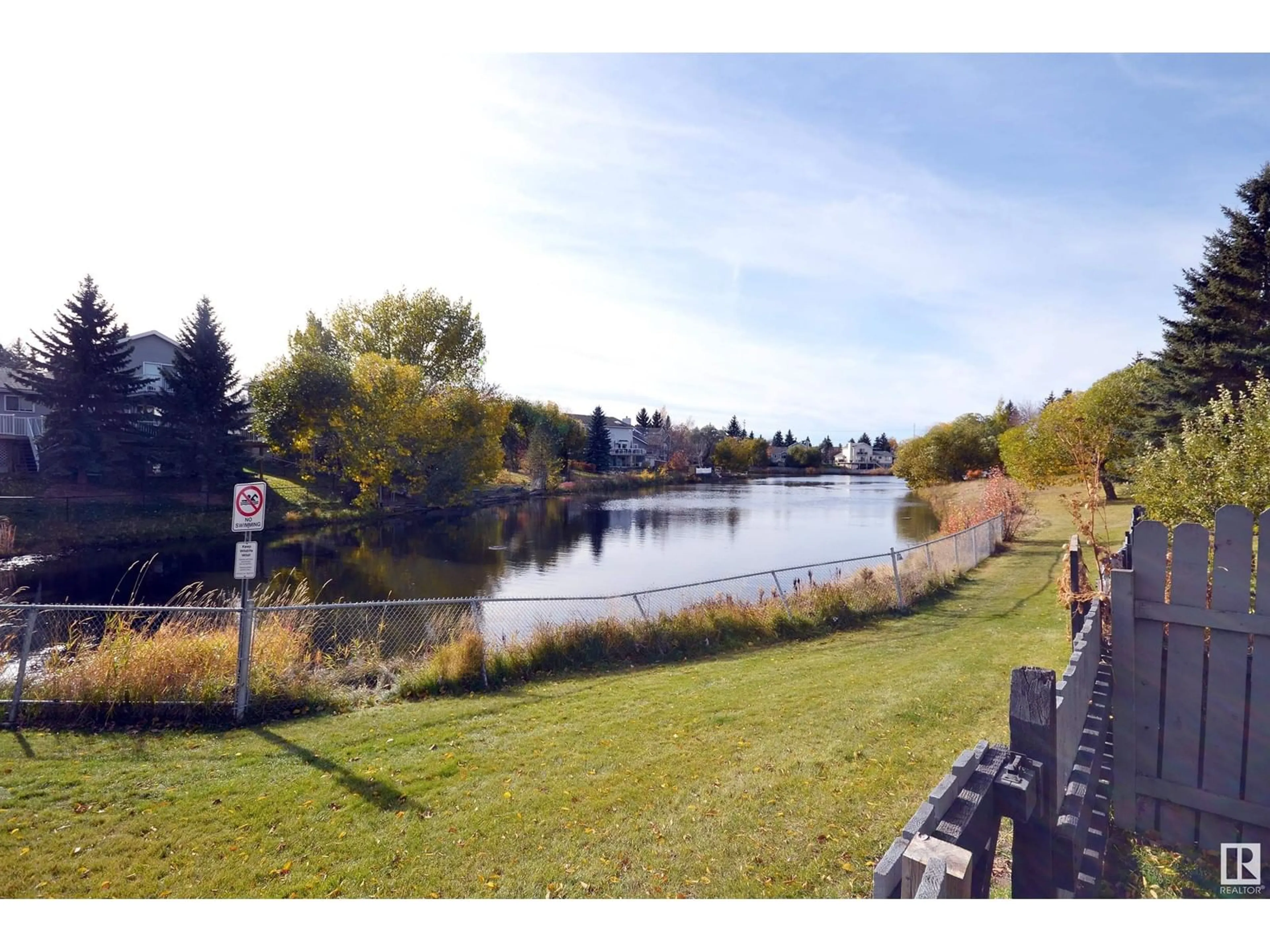 A pic from outside/outdoor area/front of a property/back of a property/a pic from drone, water/lake/river/ocean view for 864 VILLAGE LN, Sherwood Park Alberta T8A4L3