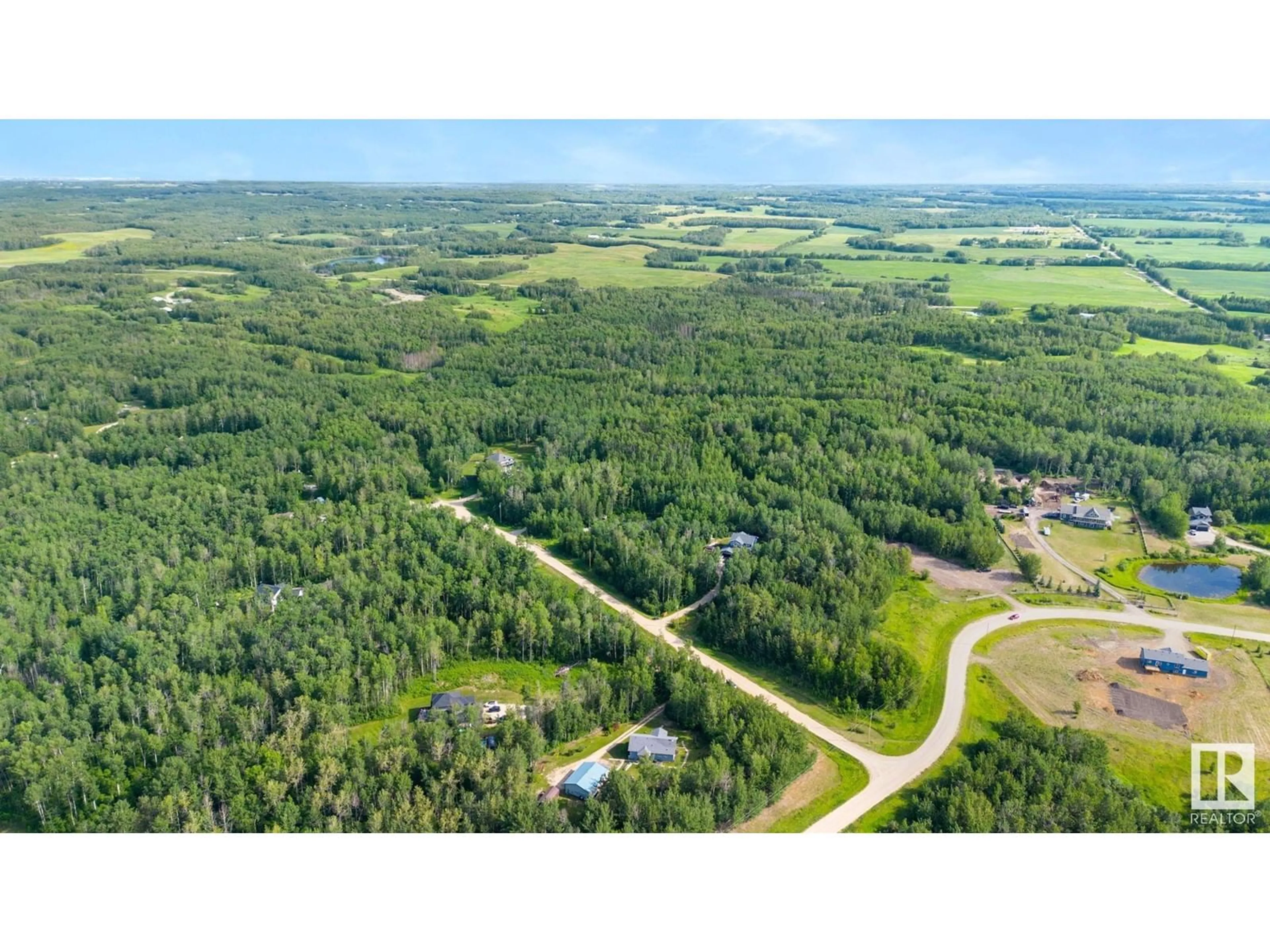 A pic from outside/outdoor area/front of a property/back of a property/a pic from drone, forest/trees view for 54419 RGE RD 14, Rural Lac Ste. Anne County Alberta T0E1V0