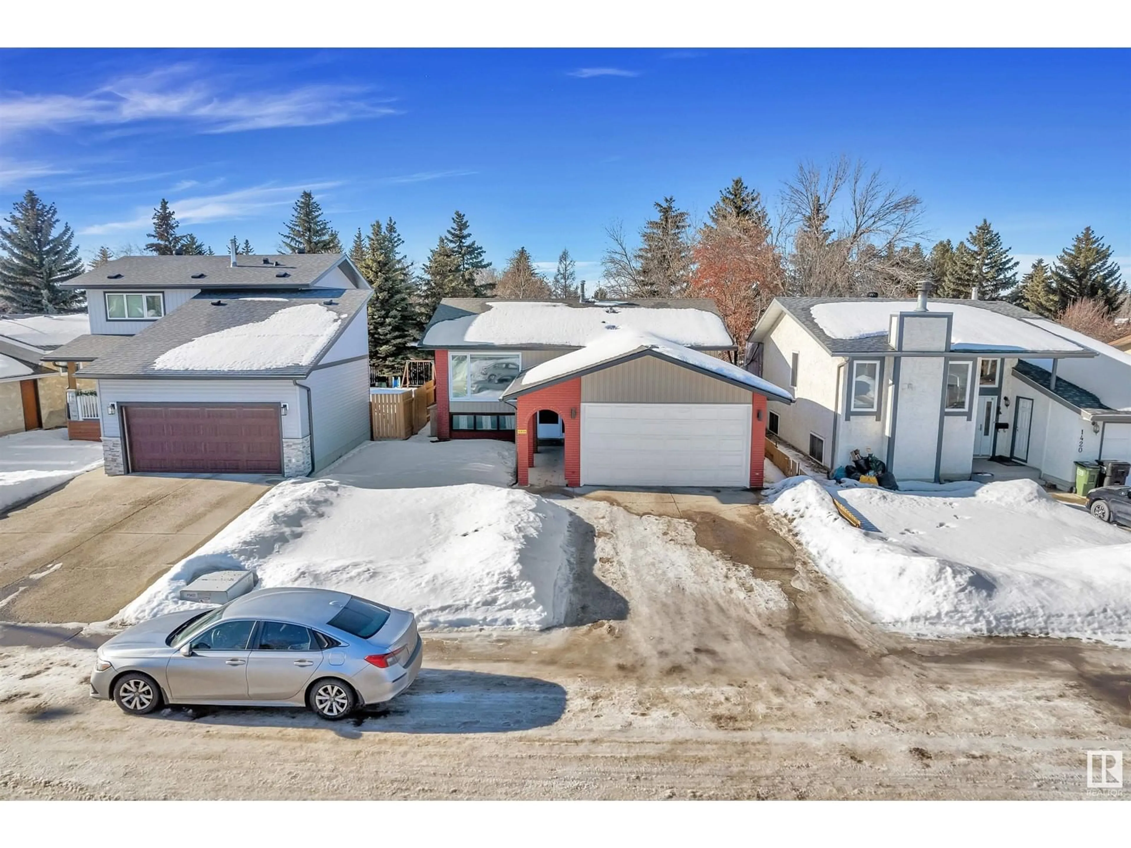 A pic from outside/outdoor area/front of a property/back of a property/a pic from drone, street for 1416 65 ST NW, Edmonton Alberta T6J2J1