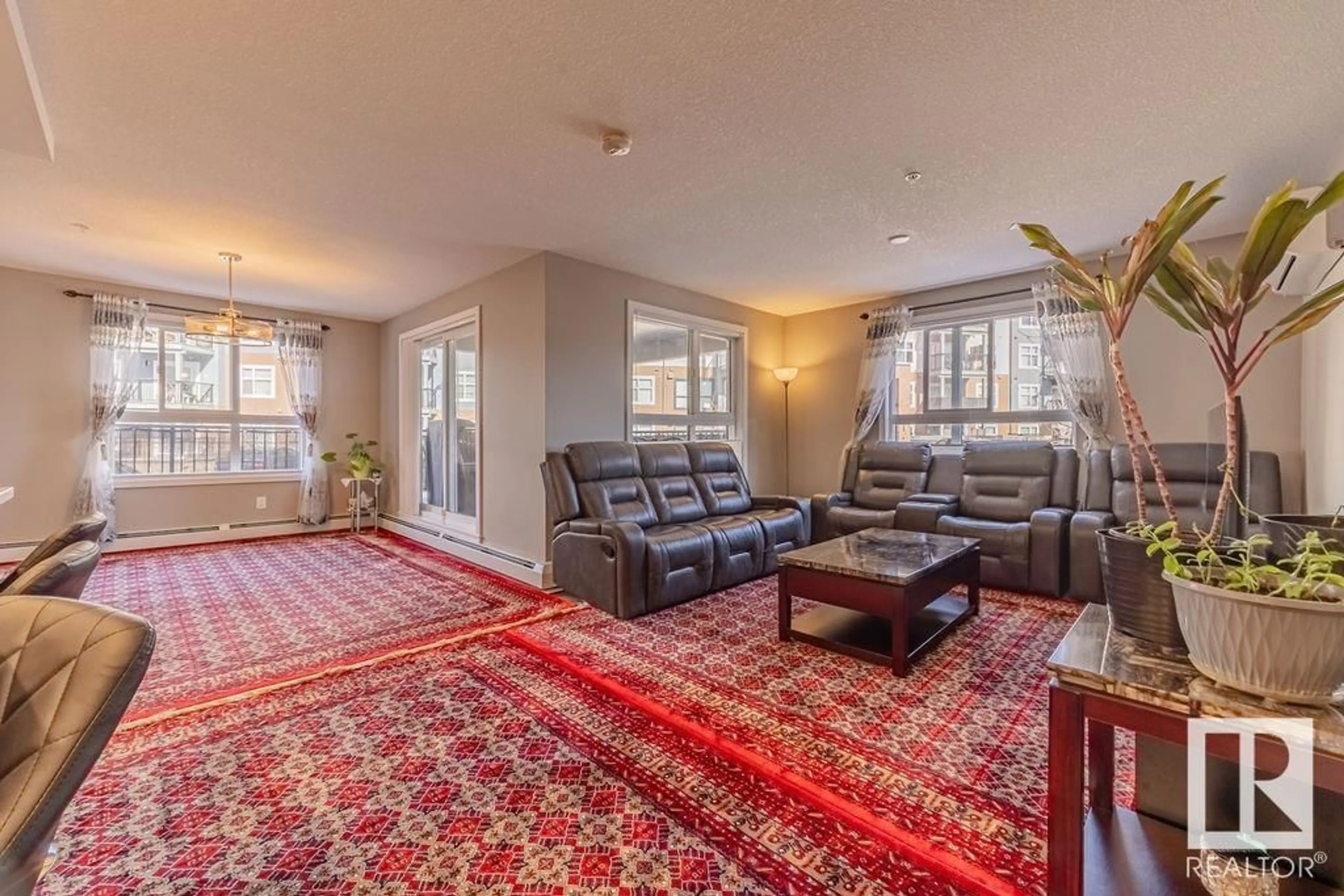 Living room with furniture, carpet floor for #140 5504 SCHONSEE DR NW, Edmonton Alberta T5Z0N9