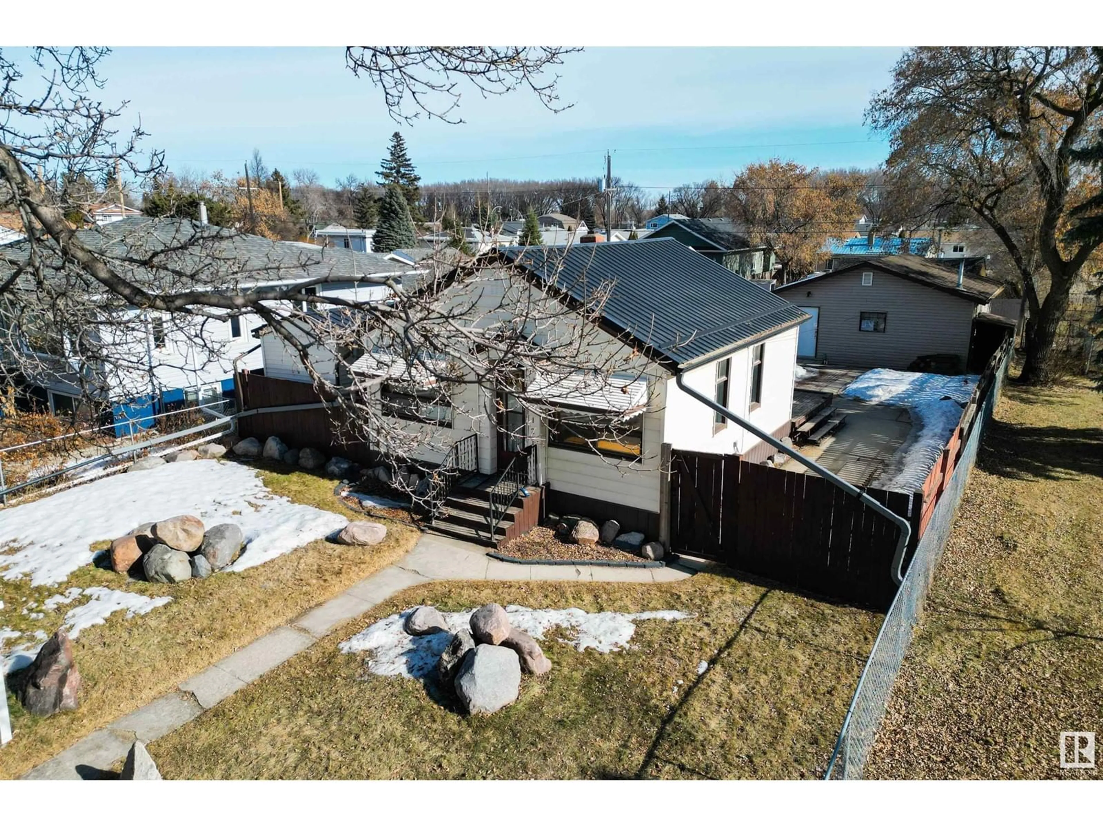 A pic from outside/outdoor area/front of a property/back of a property/a pic from drone, unknown for 12121 48 ST NW NW, Edmonton Alberta T5W2Z1