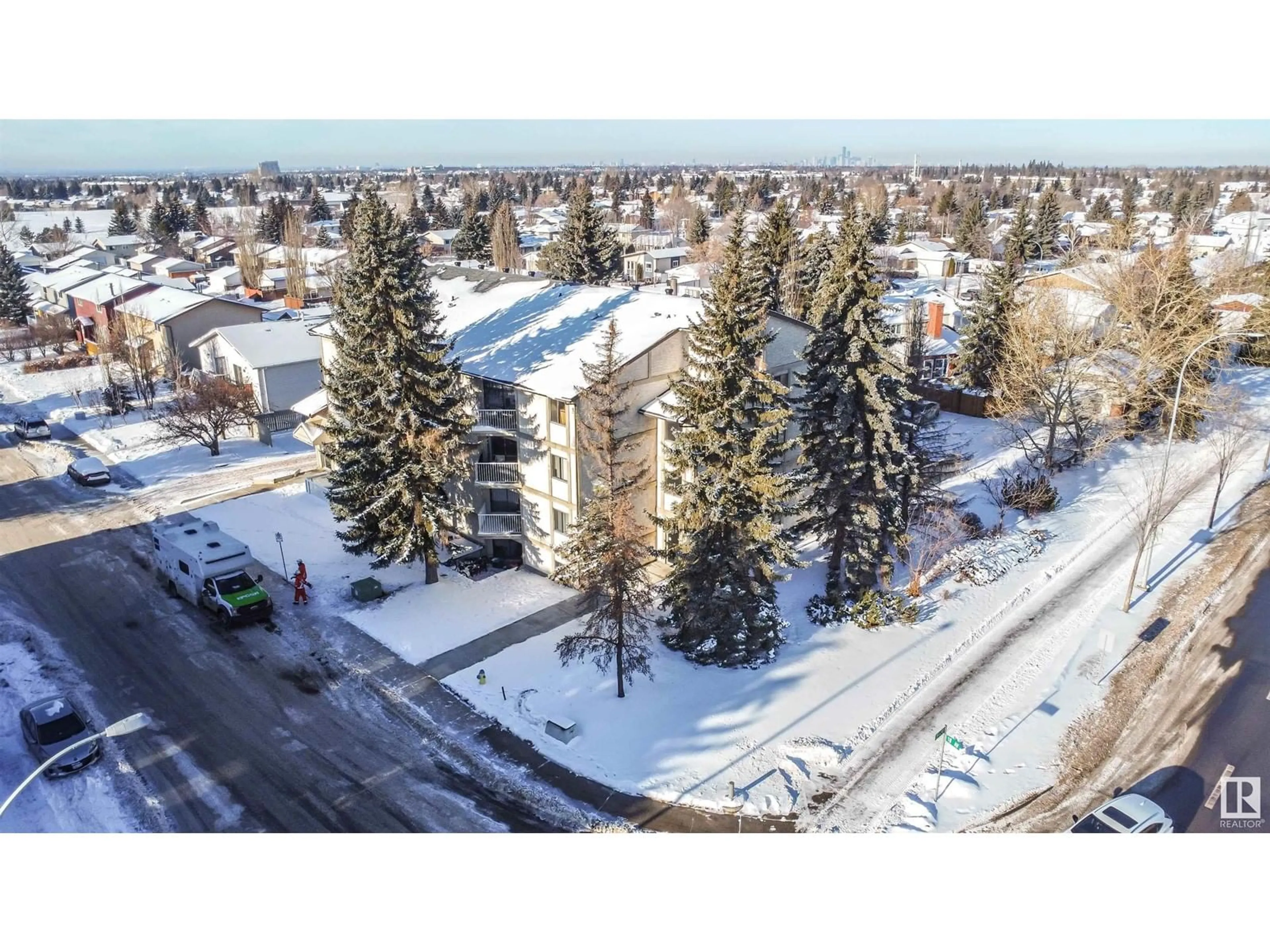 A pic from outside/outdoor area/front of a property/back of a property/a pic from drone, unknown for #103 - 3404 18 AV, Edmonton Alberta T6L3C2