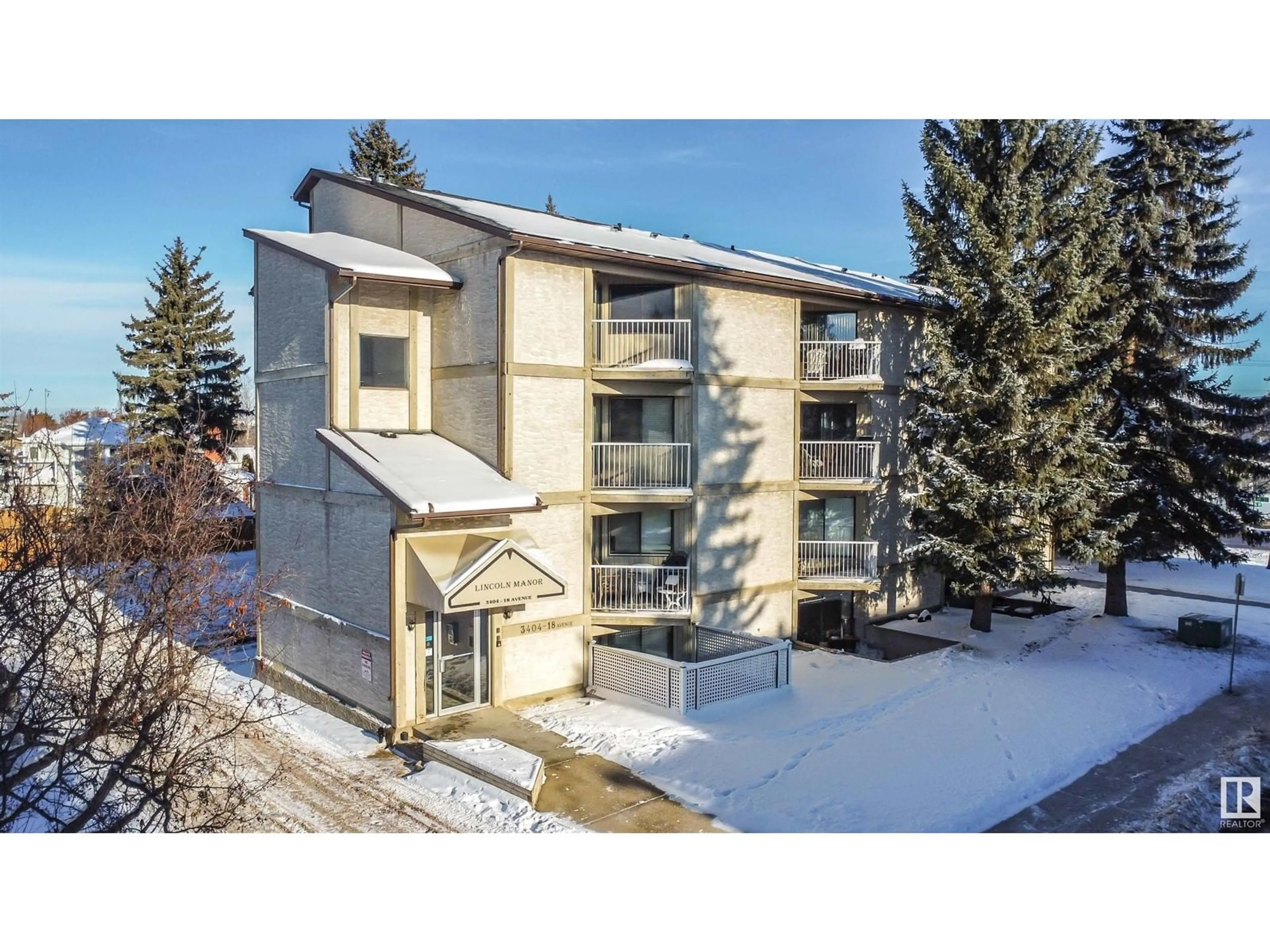 A pic from outside/outdoor area/front of a property/back of a property/a pic from drone, unknown for #103 3404 18 AV NW, Edmonton Alberta T6L3C2