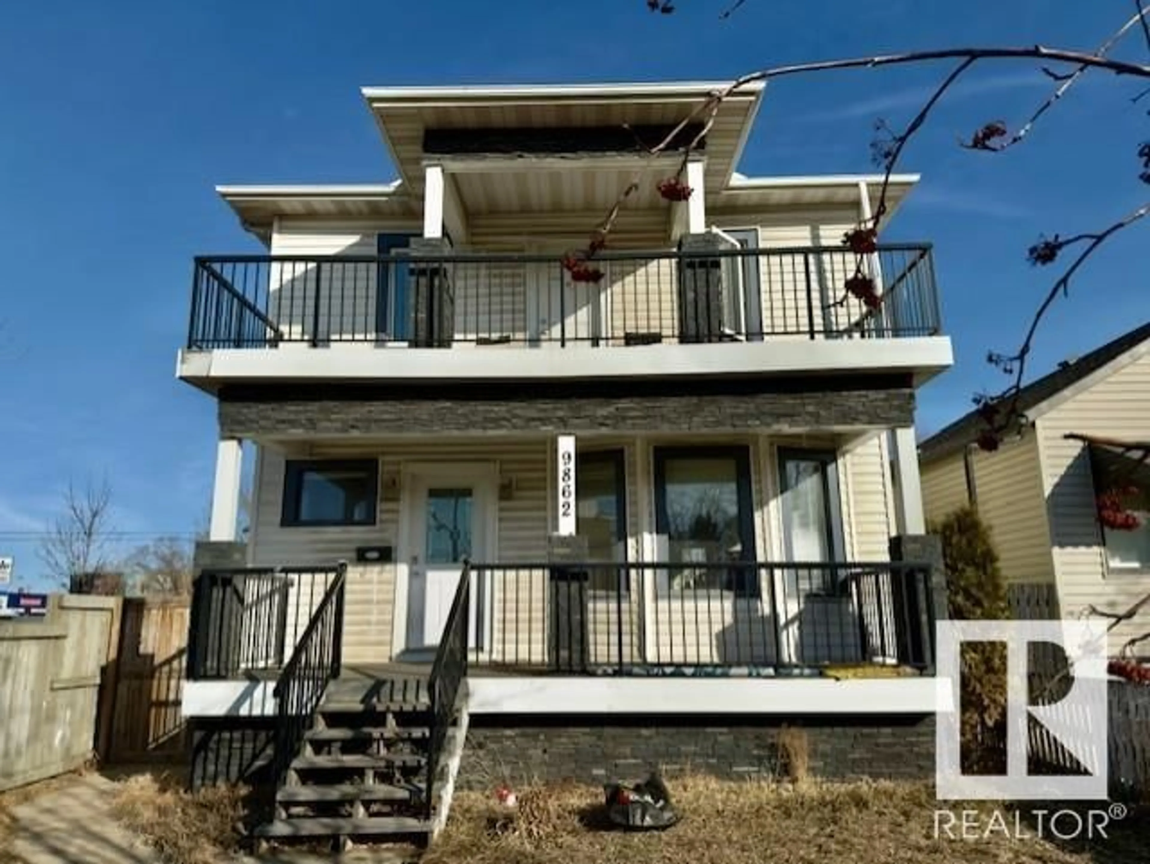 Home with vinyl exterior material, building for 9862 76 AV, Edmonton Alberta T6E1K5