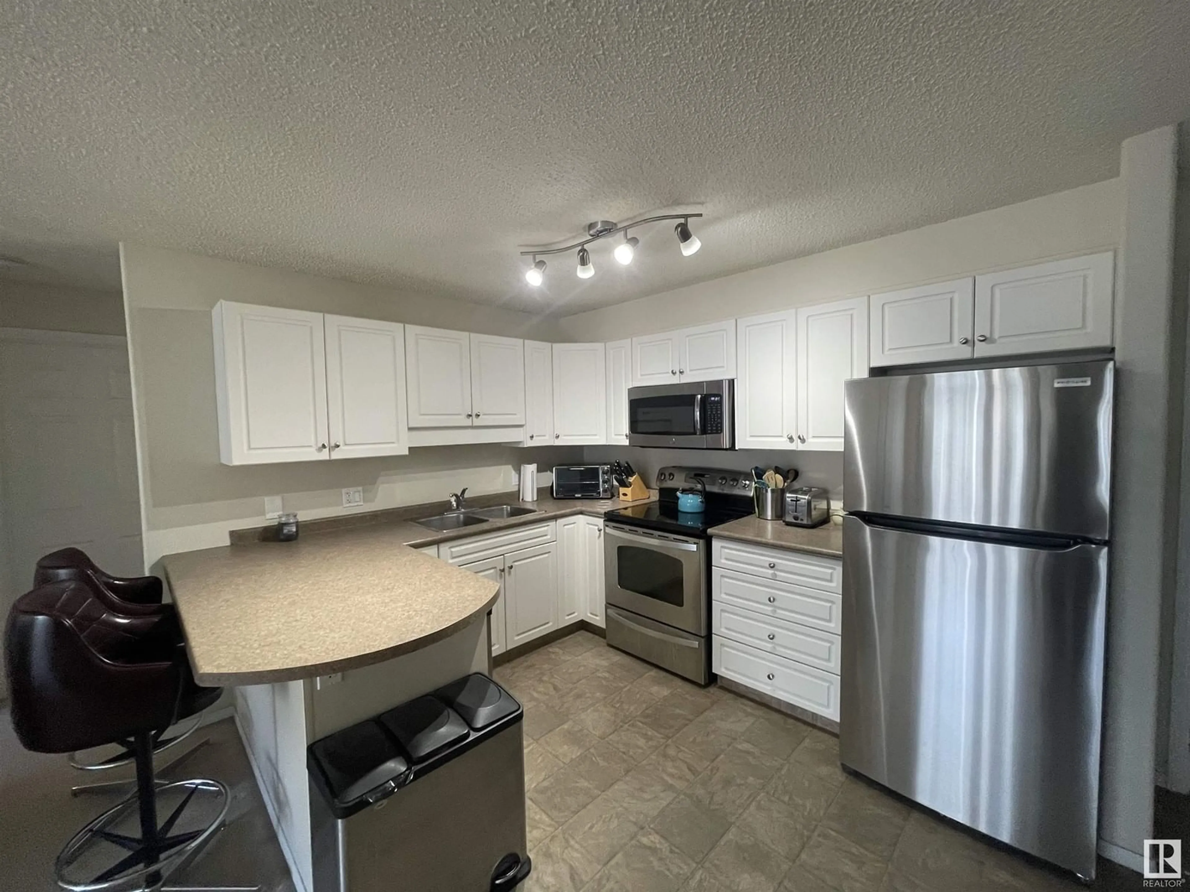 Standard kitchen, unknown for #210 13625 34 ST NW, Edmonton Alberta T5A0E3