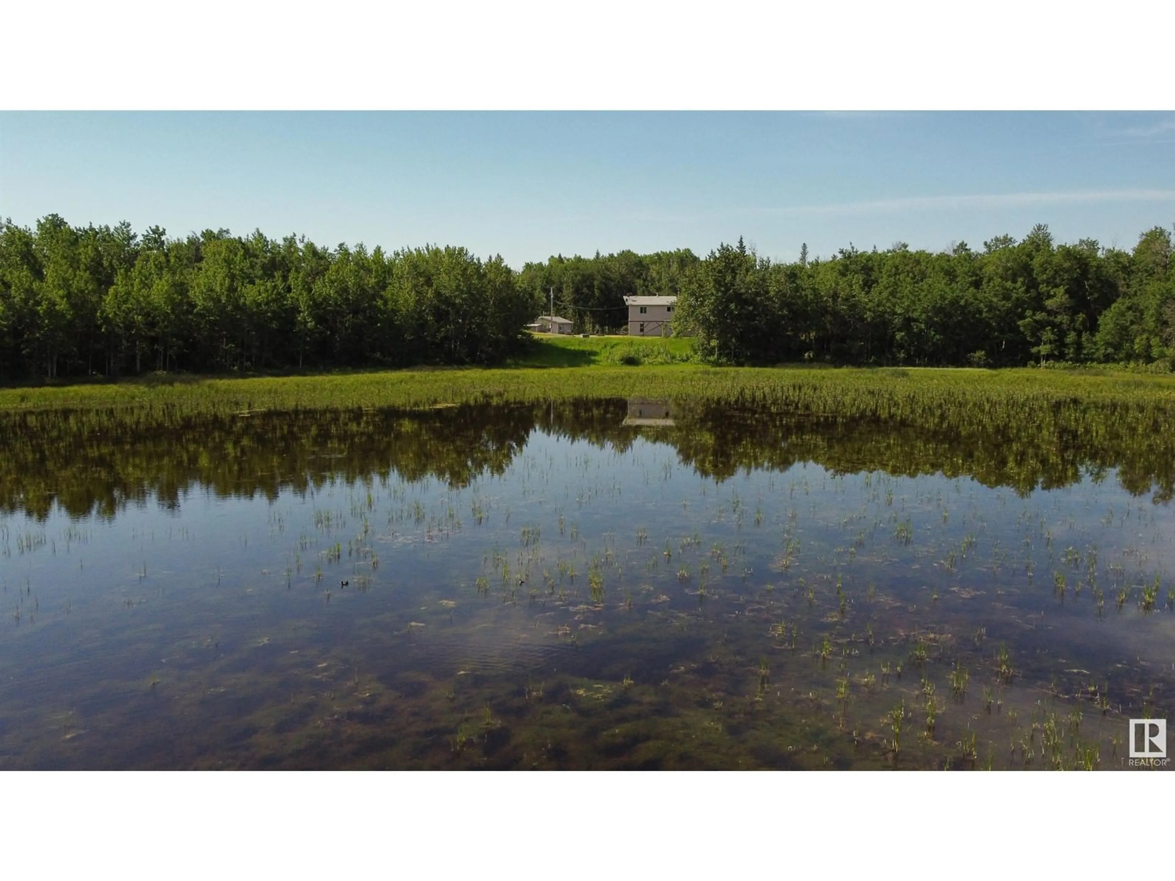 A pic from outside/outdoor area/front of a property/back of a property/a pic from drone, water/lake/river/ocean view for 51431 RR 193, Rural Beaver County Alberta T0B4J5